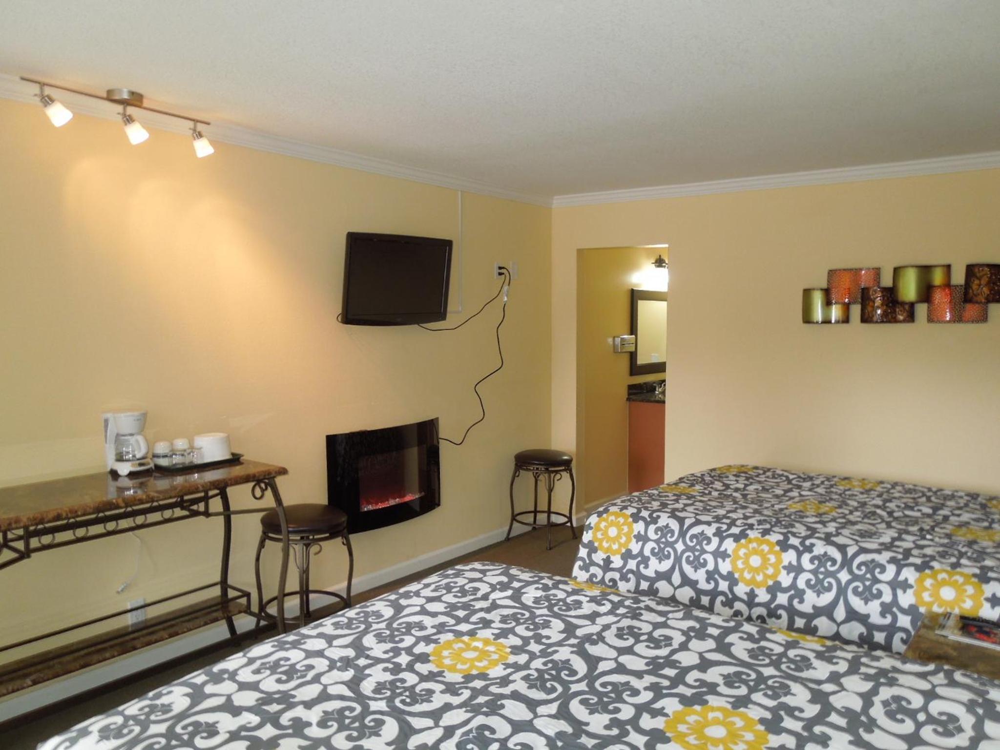 Deluxe Queen Room with Two Queen Beds - Photo 1