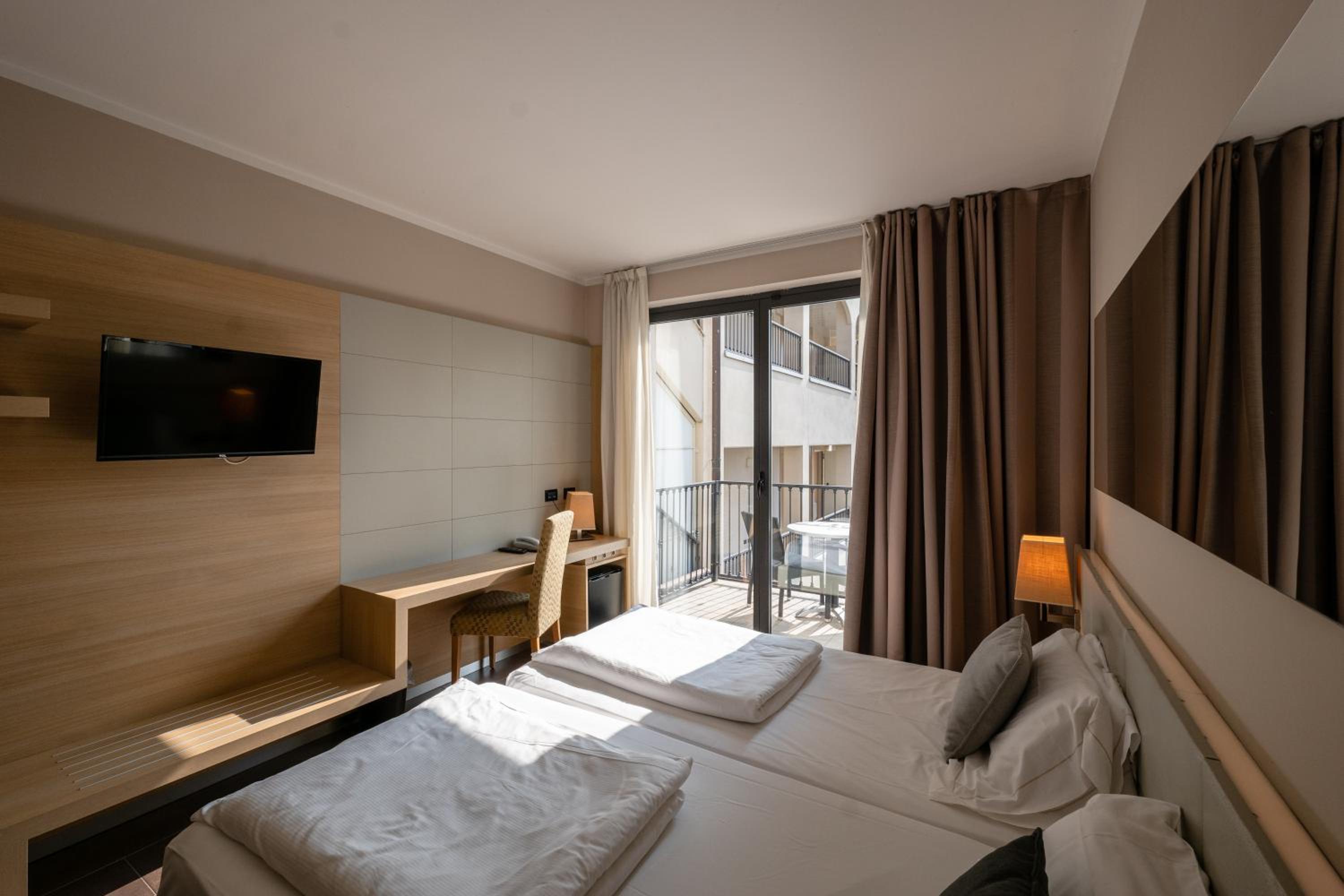 Comfort Triple/Quadruple Room with Balcony