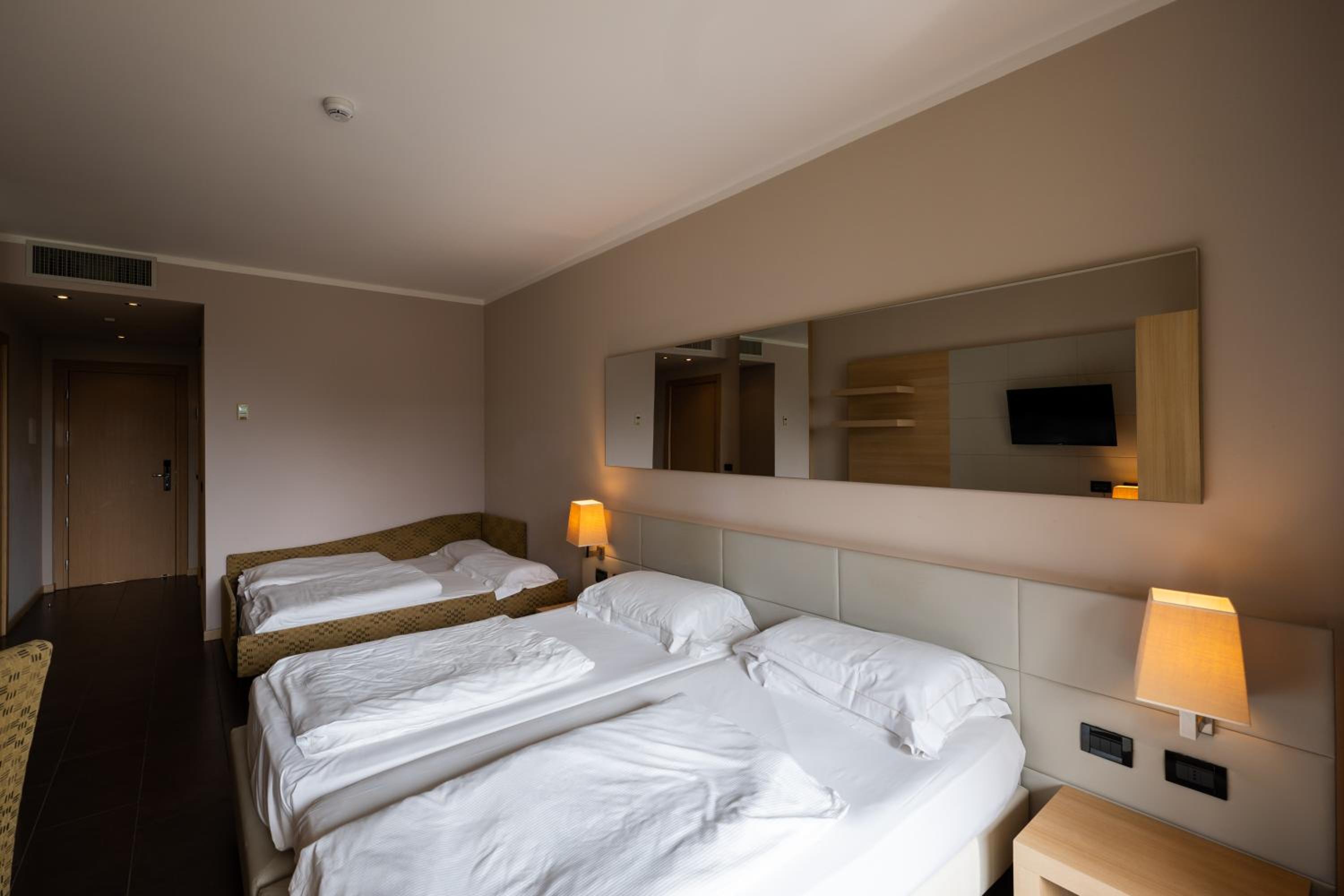 Comfort Triple/Quadruple Room with Balcony