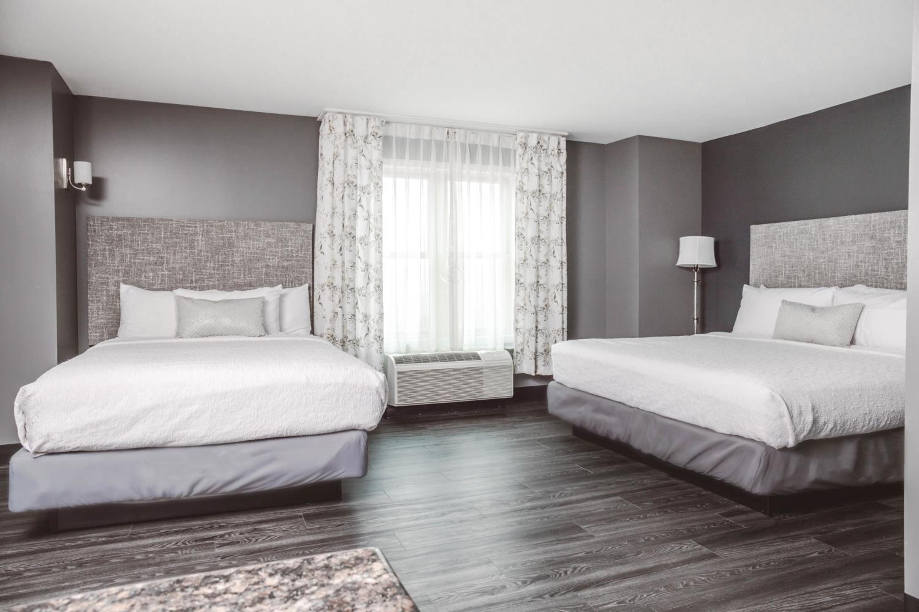 Queen Room with Two Queen Beds - Photo 1