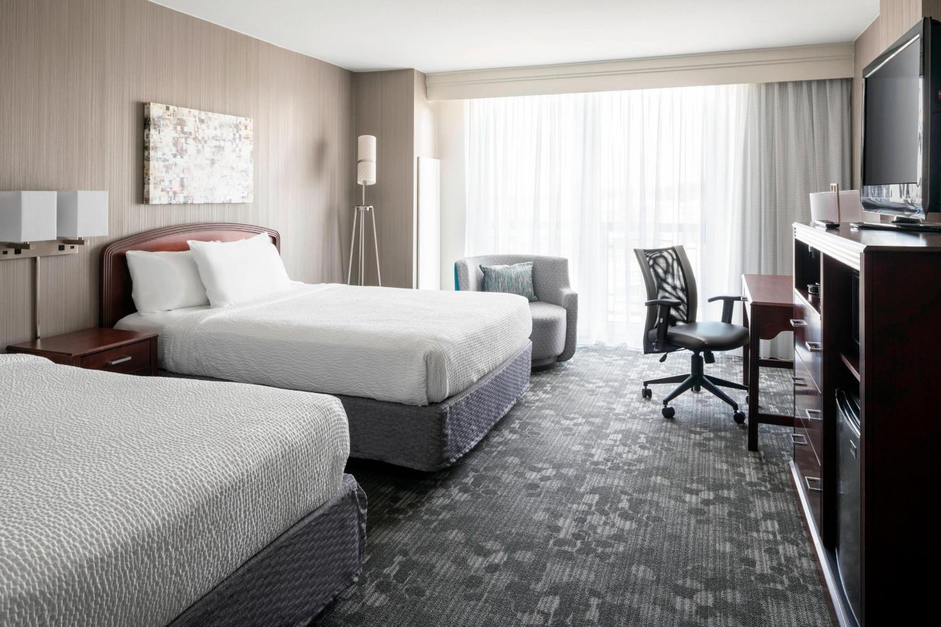 Queen Room with Two Queen Beds - Photo 1