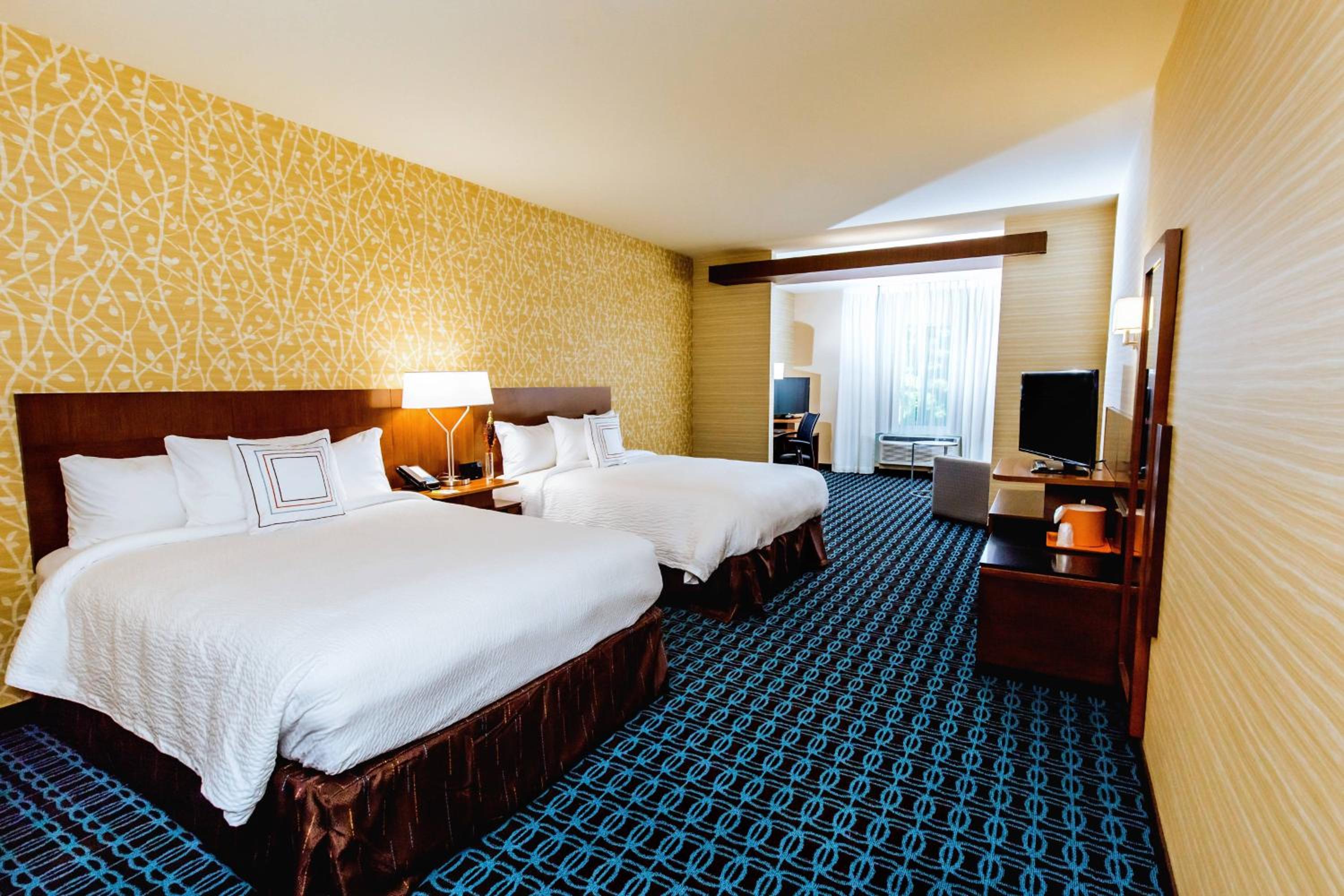 Queen Suite with Two Queen Beds and Sofa Bed