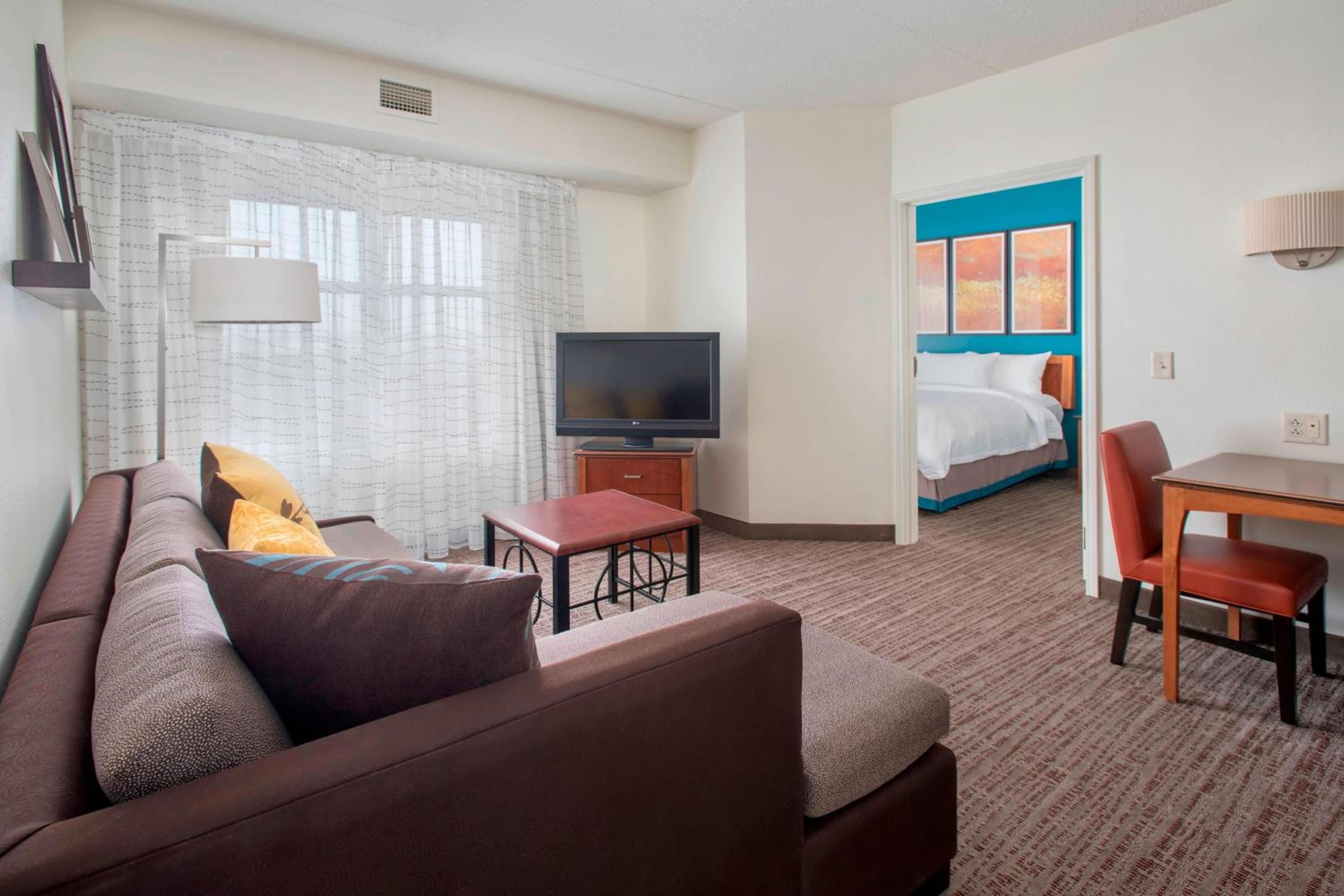 One-Bedroom Queen Suite with Sofa Bed - Photo 1