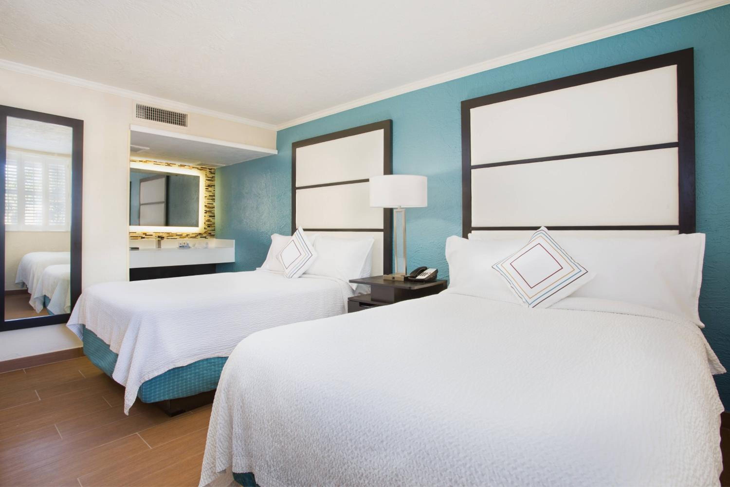 Double Suite with Two Double Beds and Sofa Bed photo 2