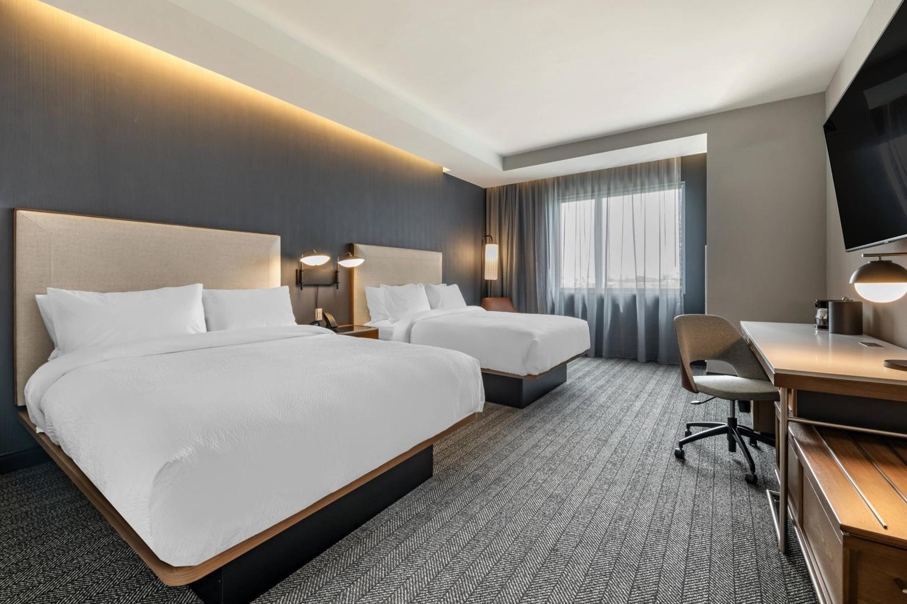 Queen Room with Two Queen Beds - Photo 1