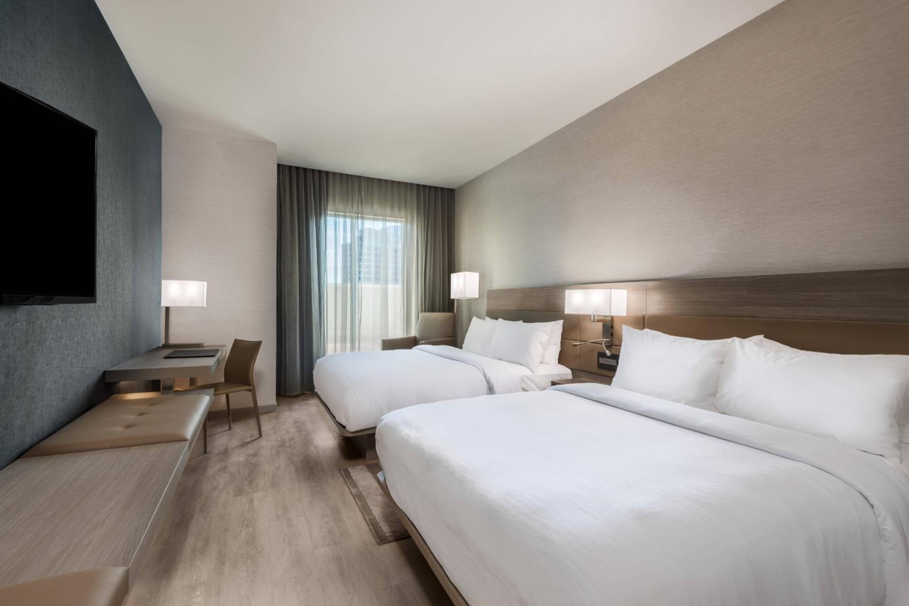 Queen Room with Two Queen Beds - Hearing Accessible at AC Hotel by Marriott Charlotte City Center in Charlotte