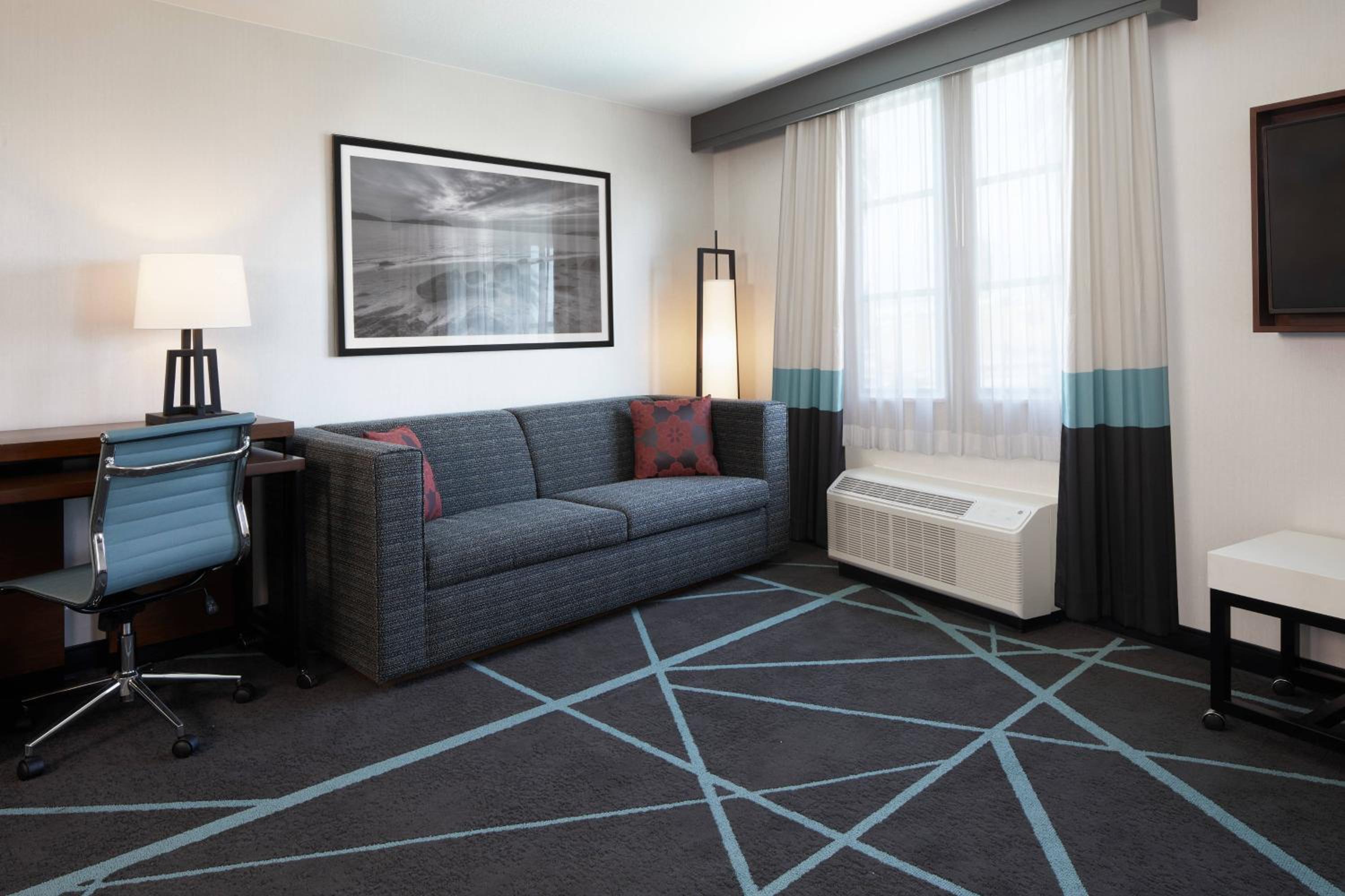 King Suite with Sofa Bed and Adapted Tub - Mobility and Hearing Accessible photo 2