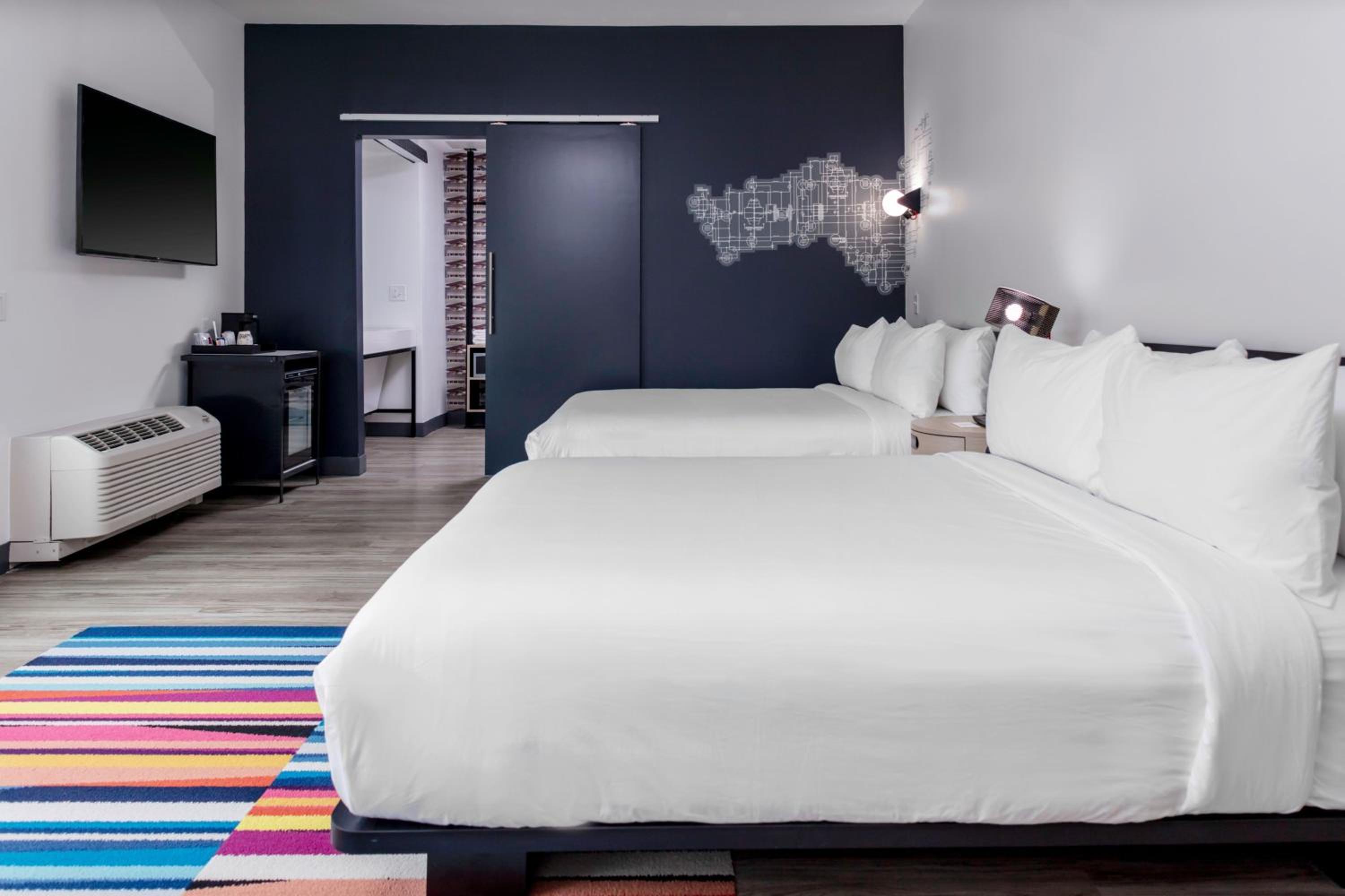 Queen Room with Two Queen Beds - Photo 1