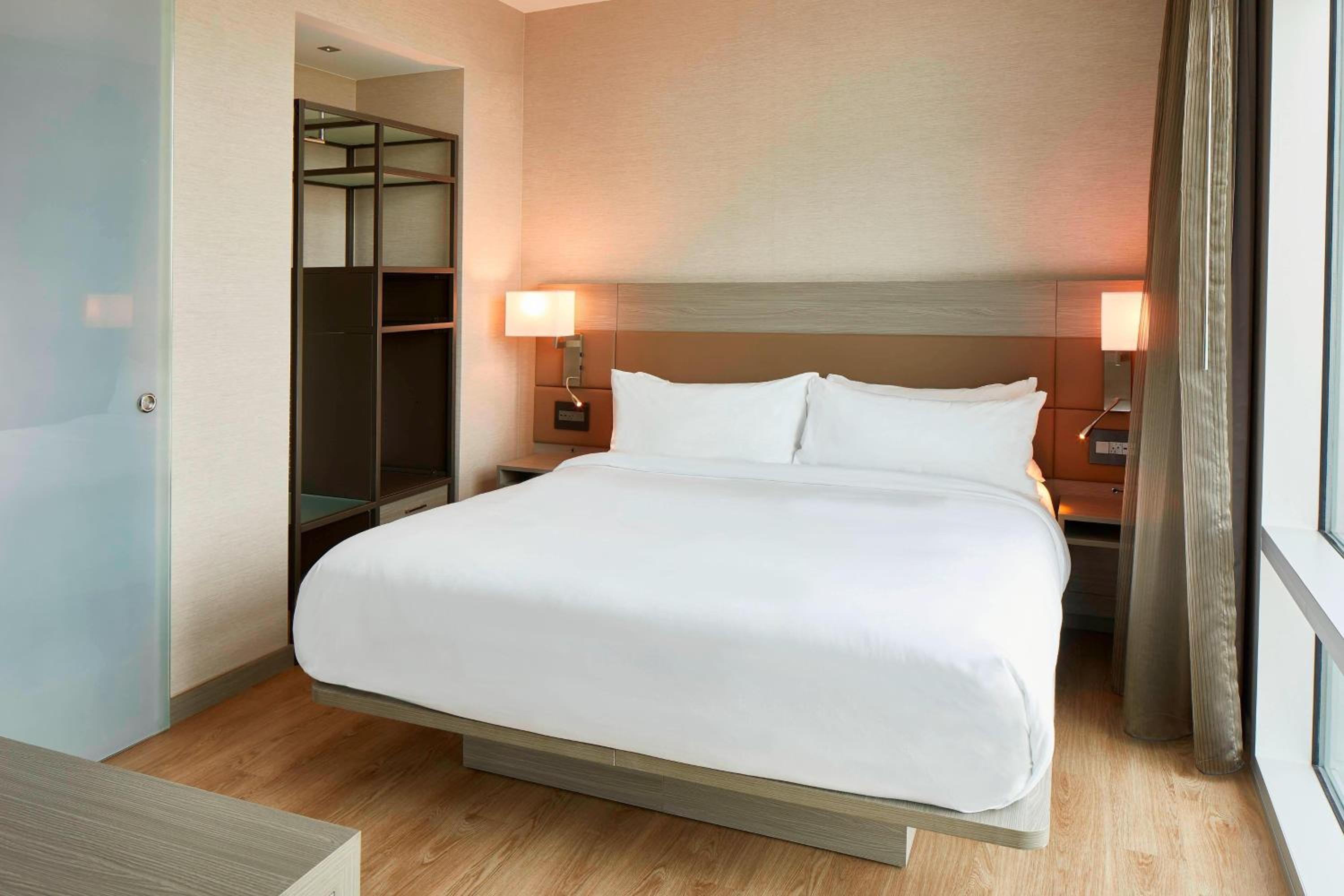 Corner Junior King Suite with Sofa Bed