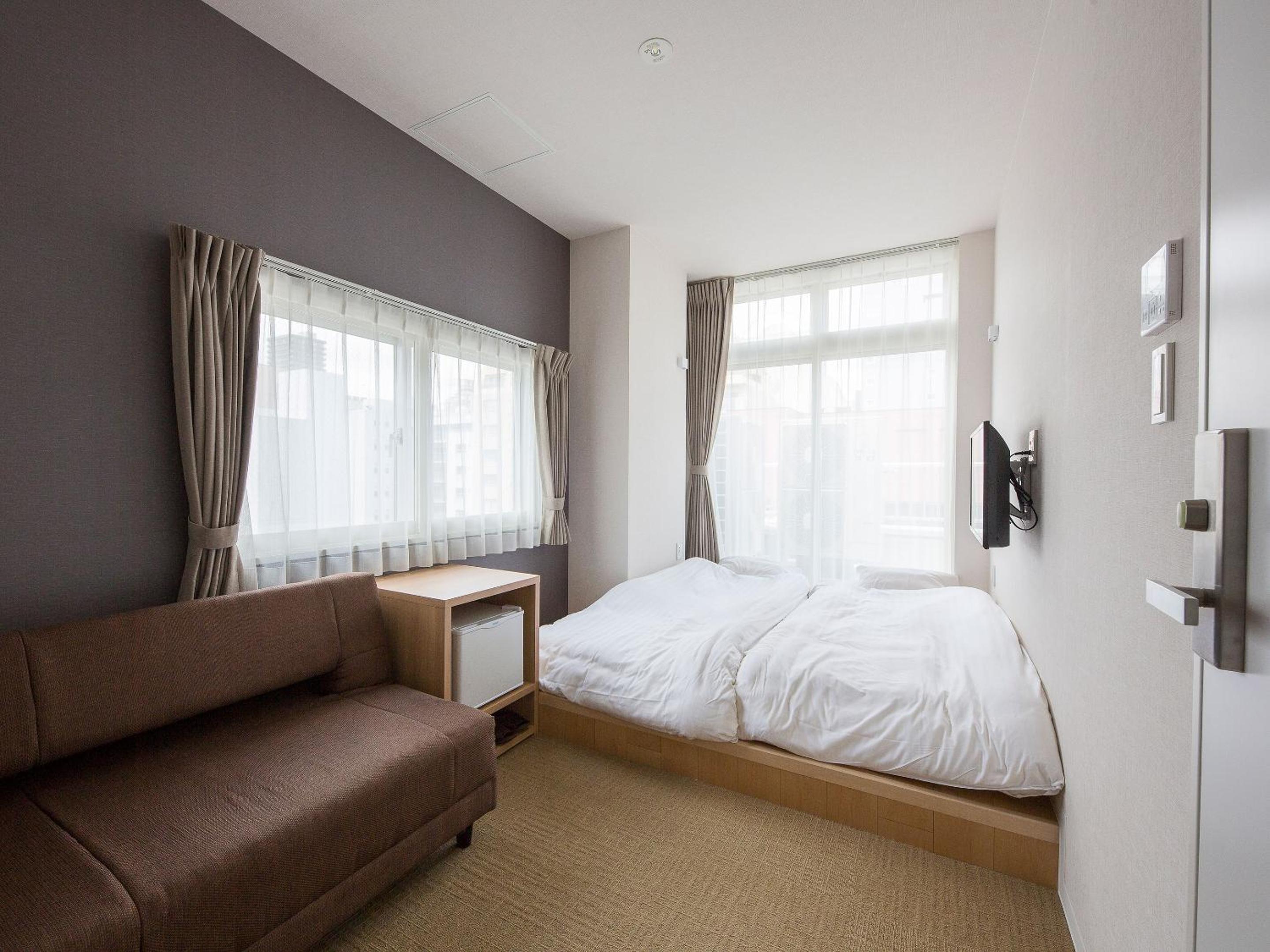 Triple Room with Private Bathroom - Photo 1
