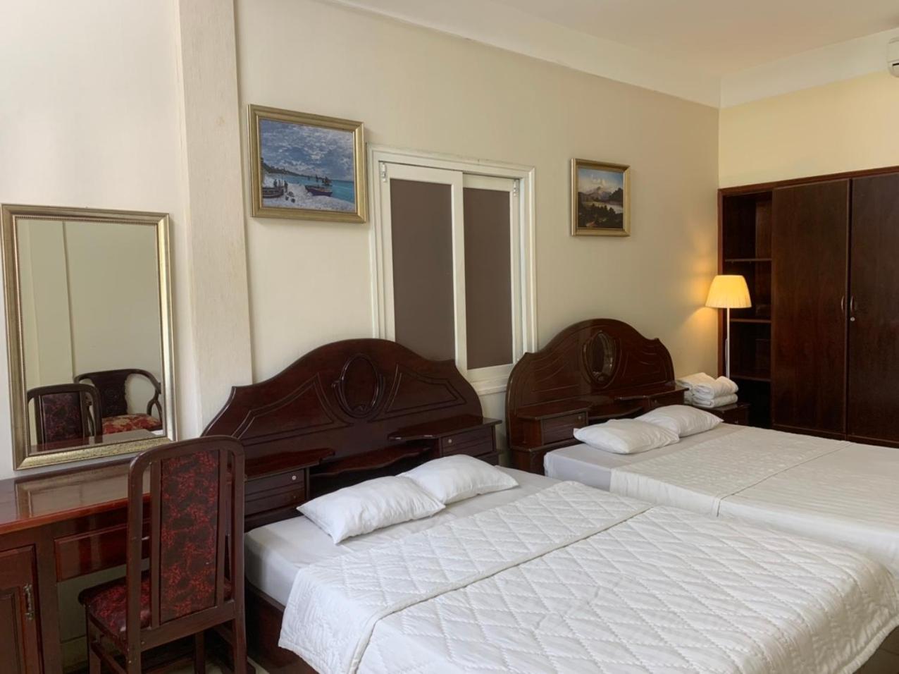 Standard Quadruple Room - Photo 8