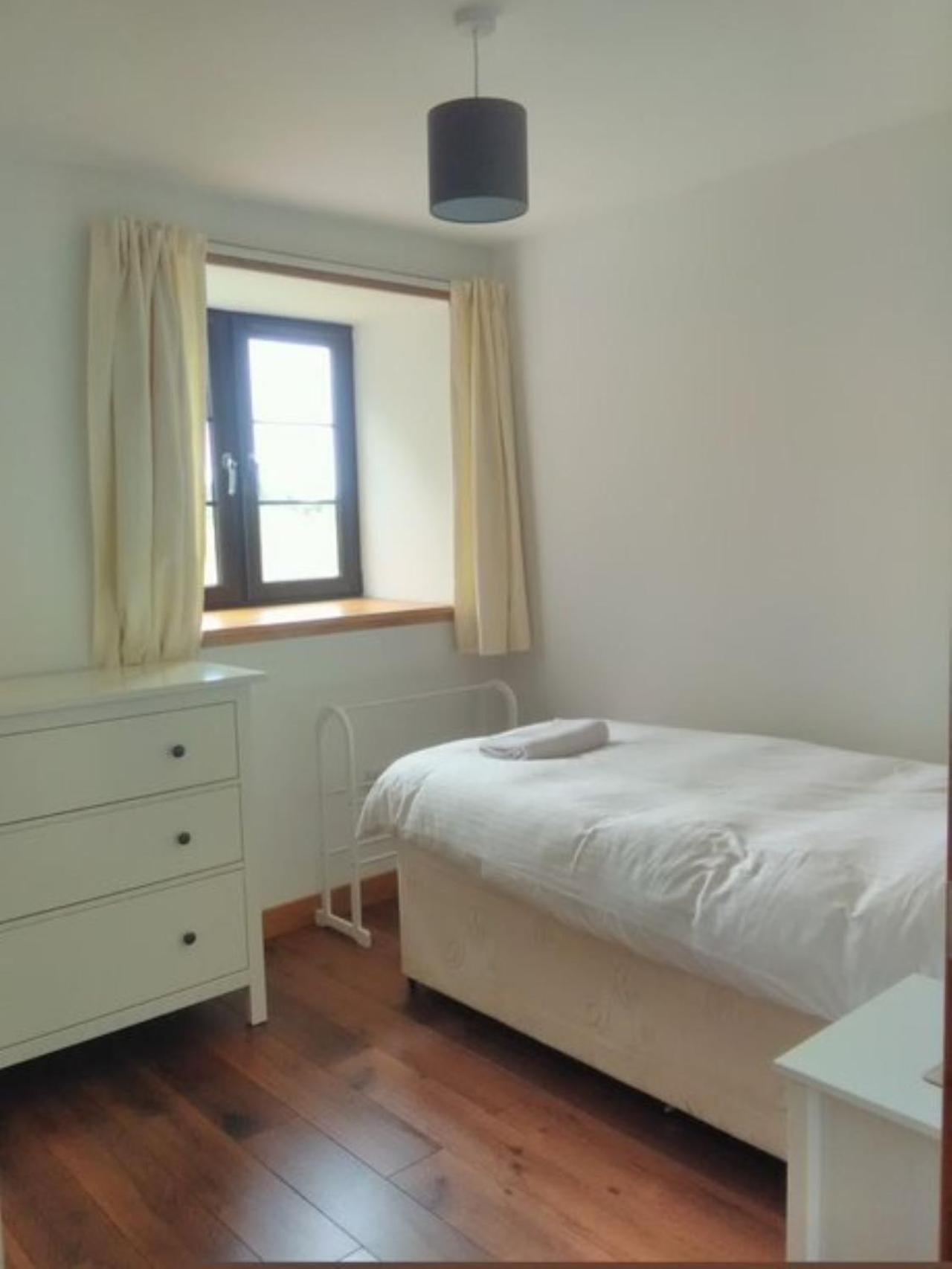 Three-Bedroom Apartment photo 1