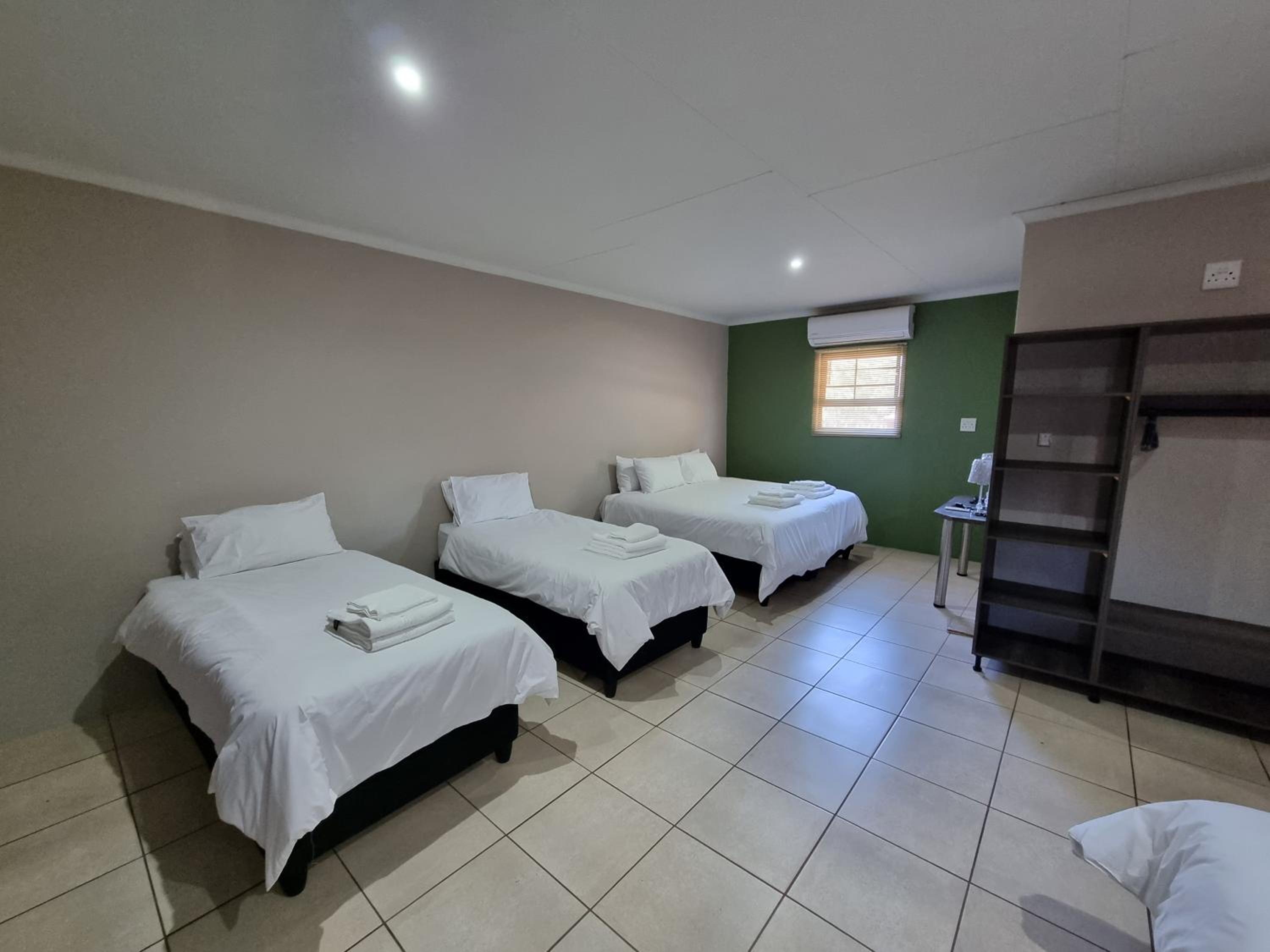 Deluxe Family Suite - Photo 1
