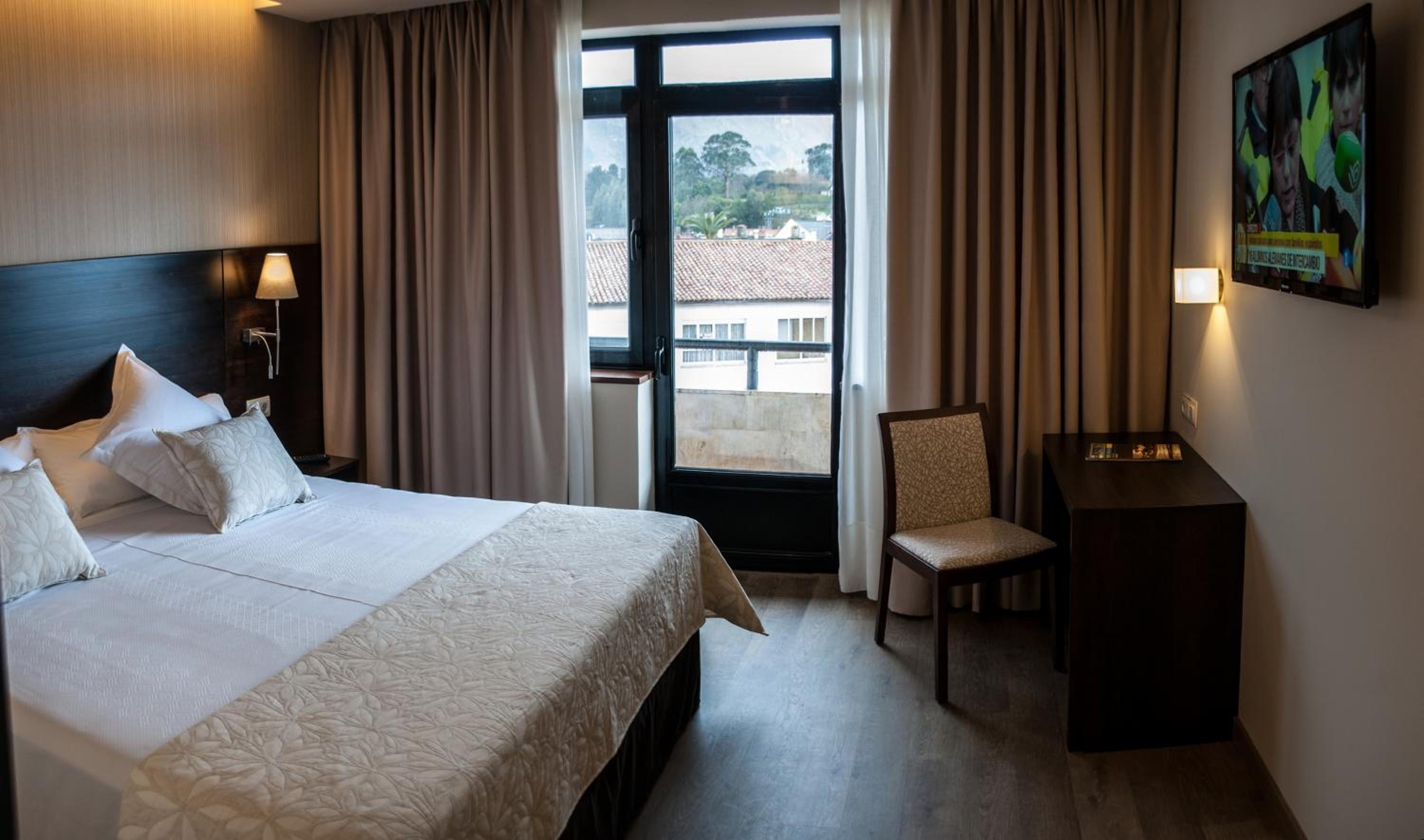 Habitación King con Balcón