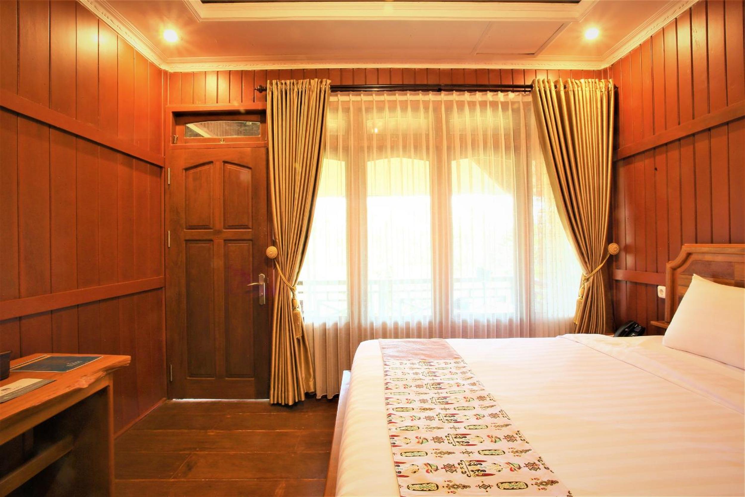 Deluxe Room - Photo 8