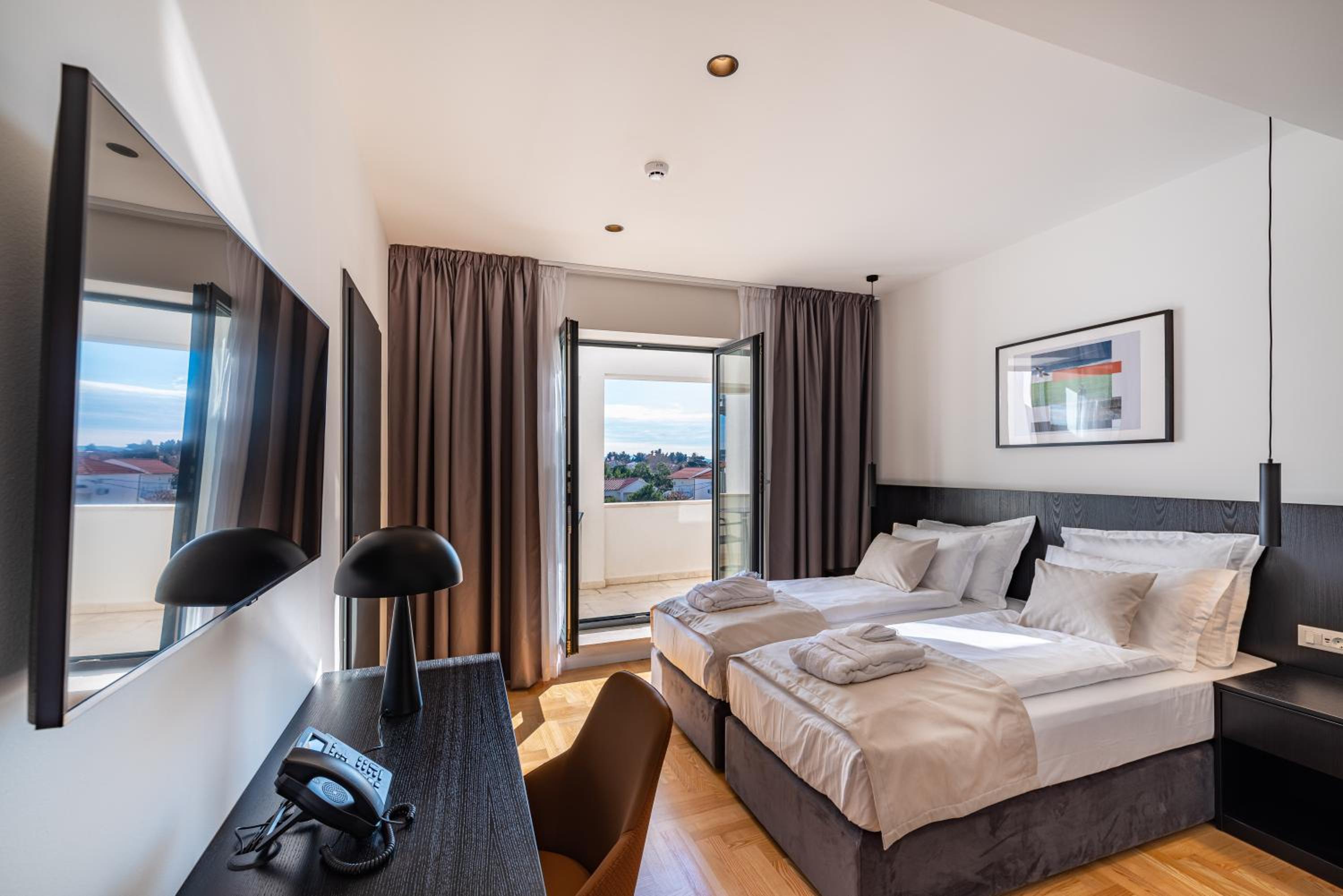 Twin Room with Balcony - Photo 1