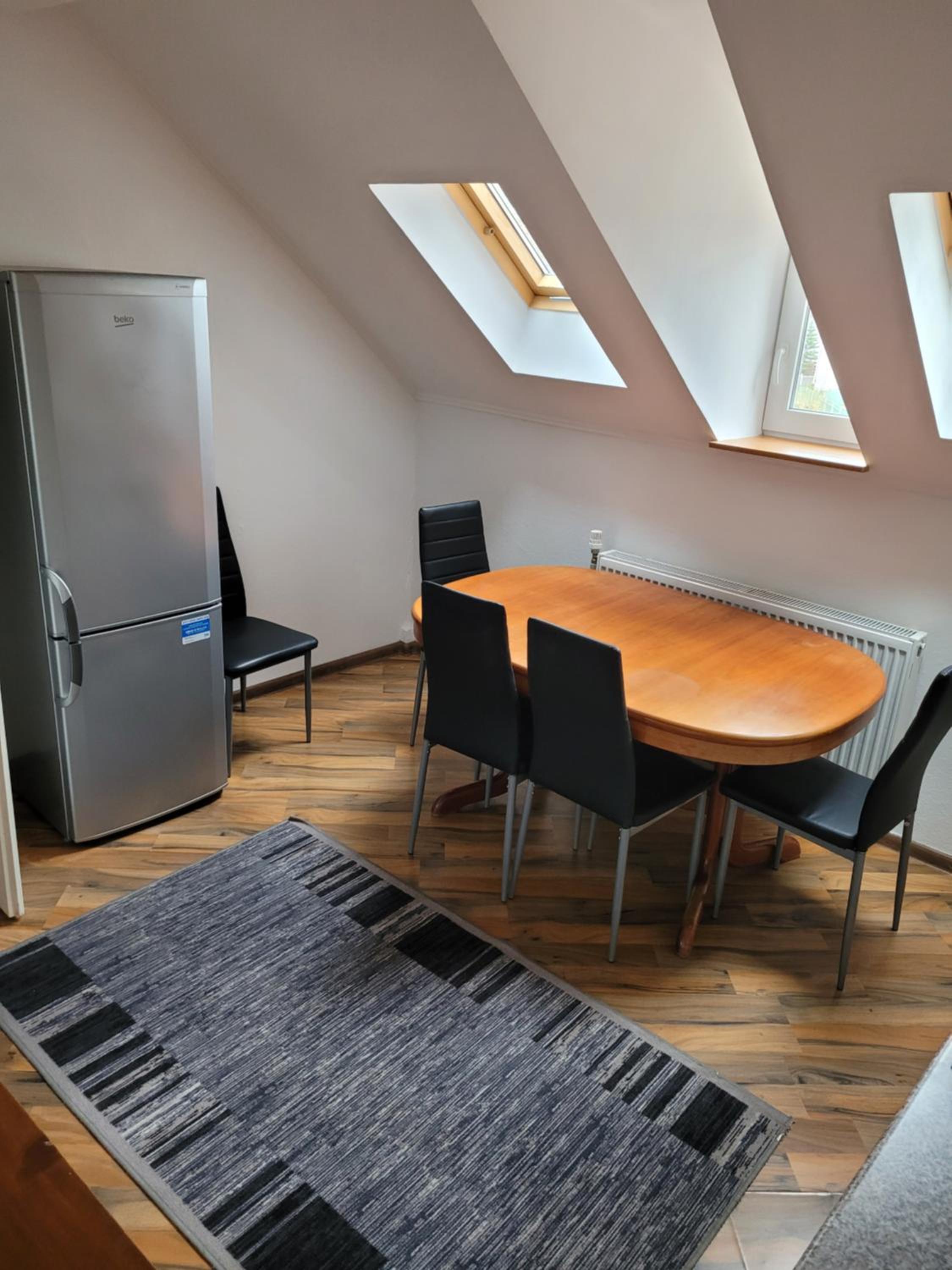Three-Bedroom Apartment - Photo 13