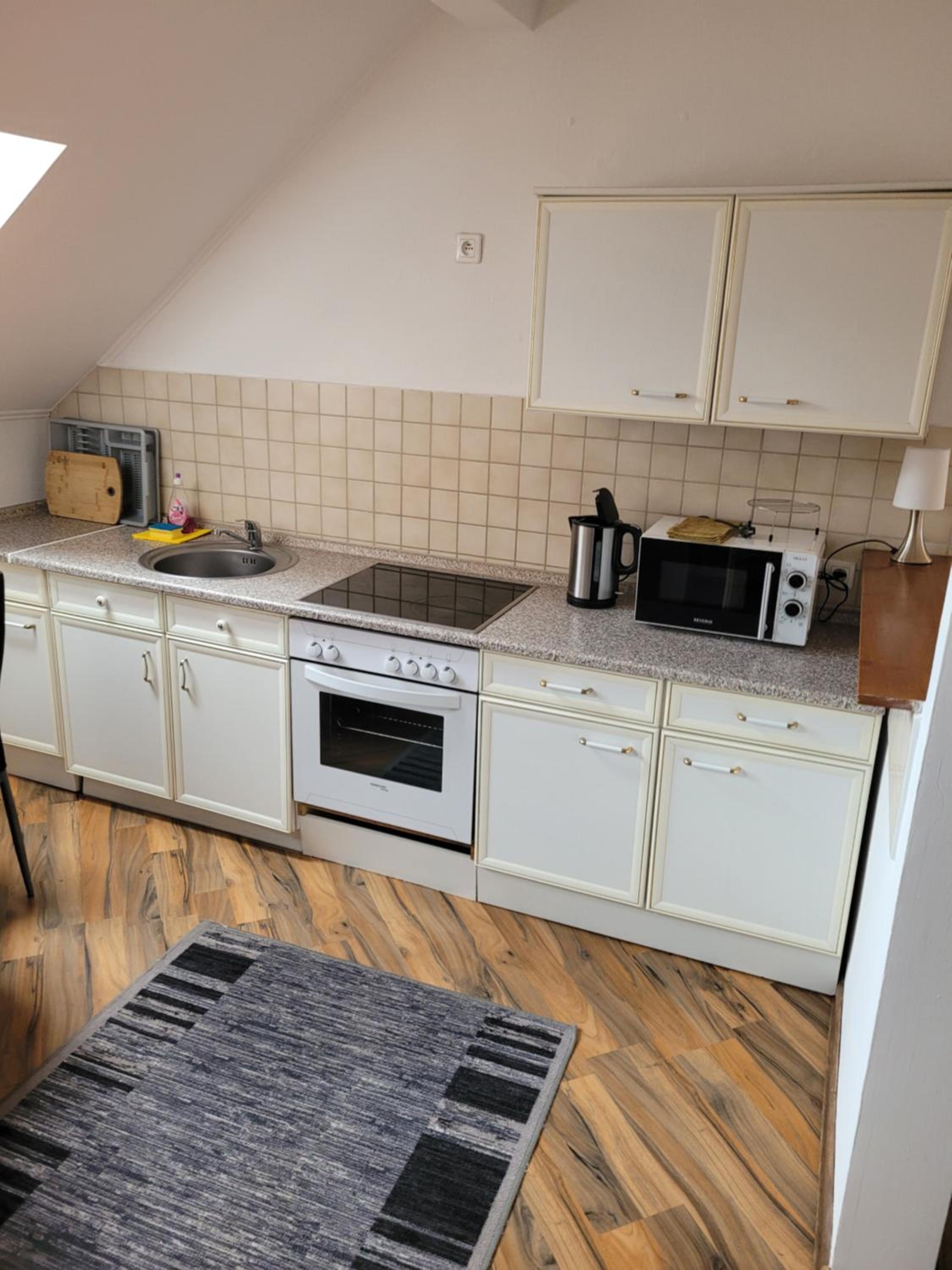 Three-Bedroom Apartment - Photo 15