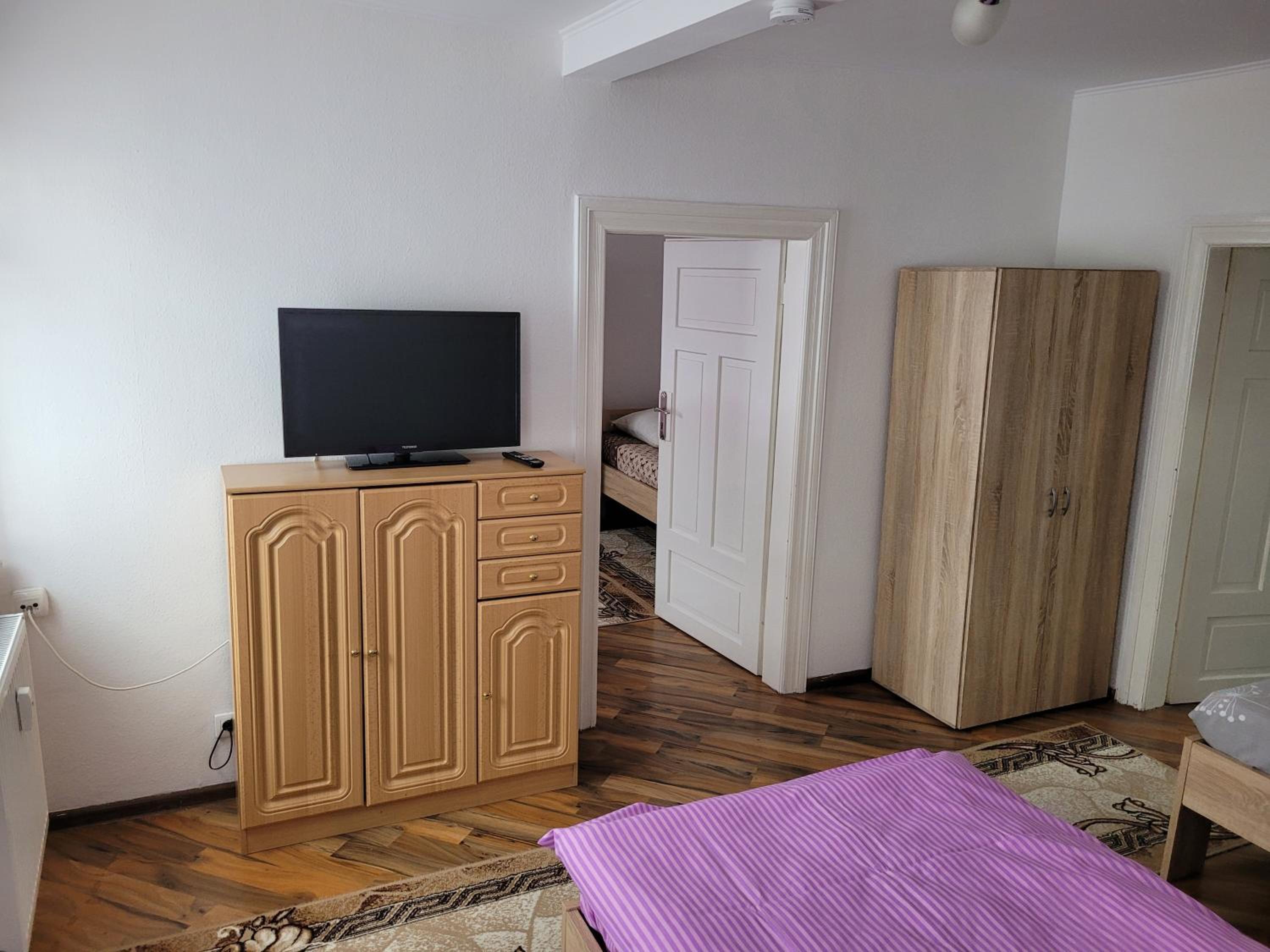 Three-Bedroom Apartment - Photo 10