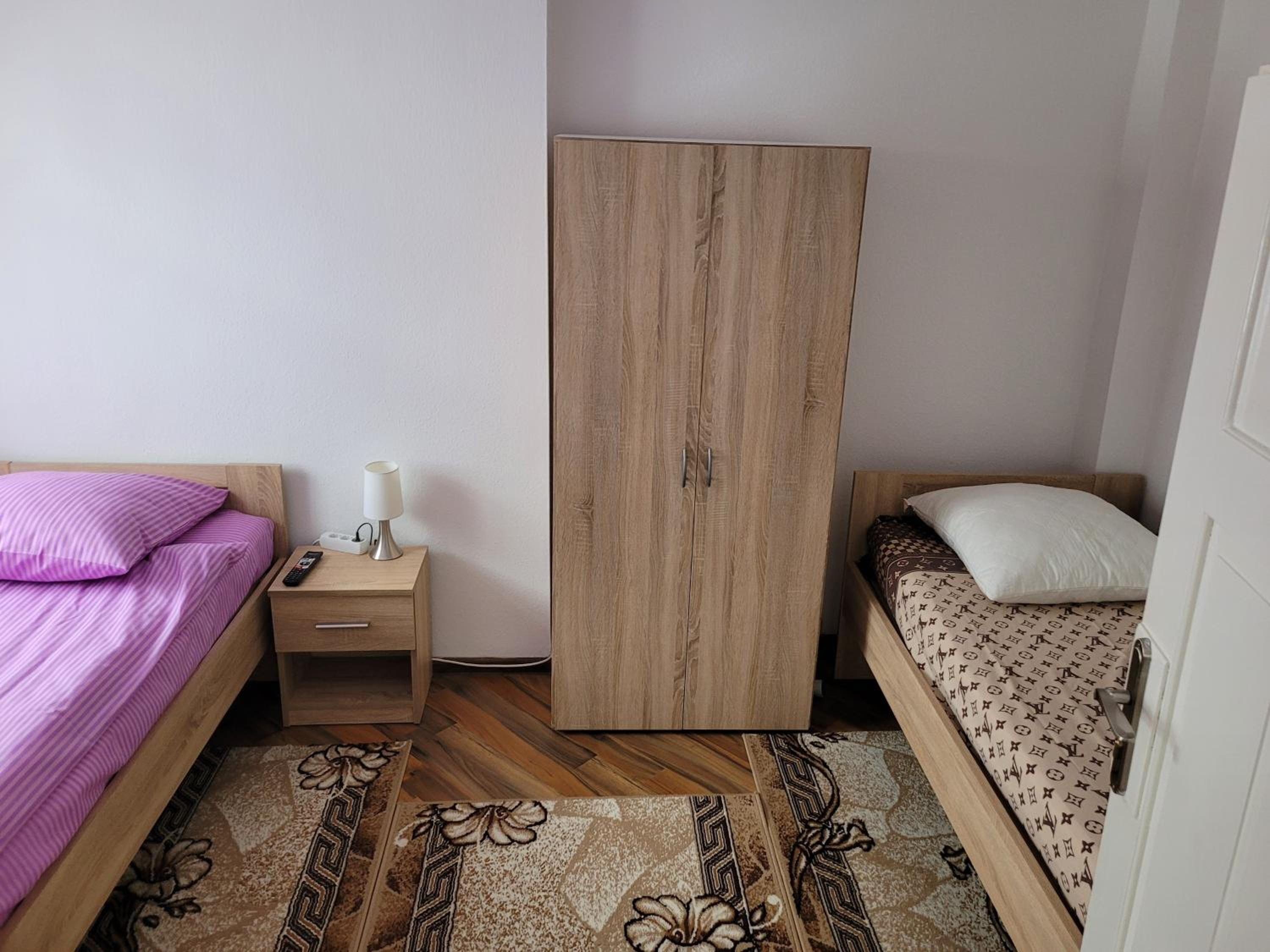 Three-Bedroom Apartment - Photo 9