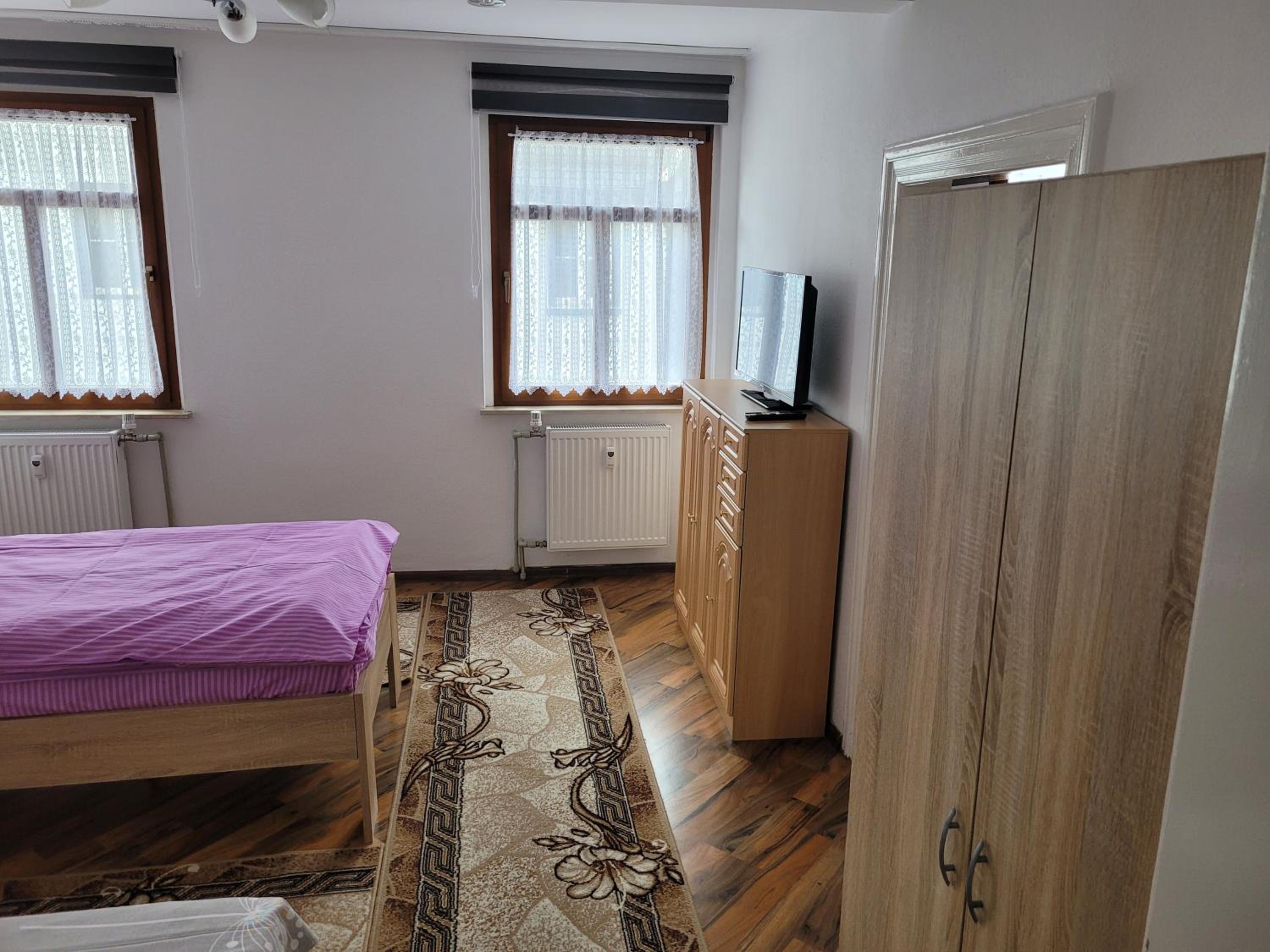 Three-Bedroom Apartment - Photo 4