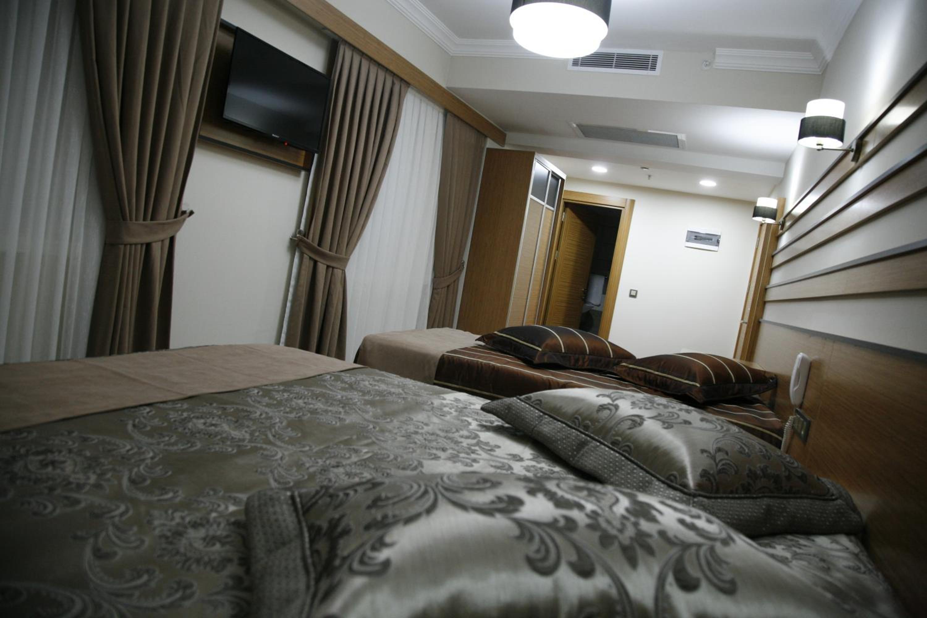 Standard Triple Room - Photo 1
