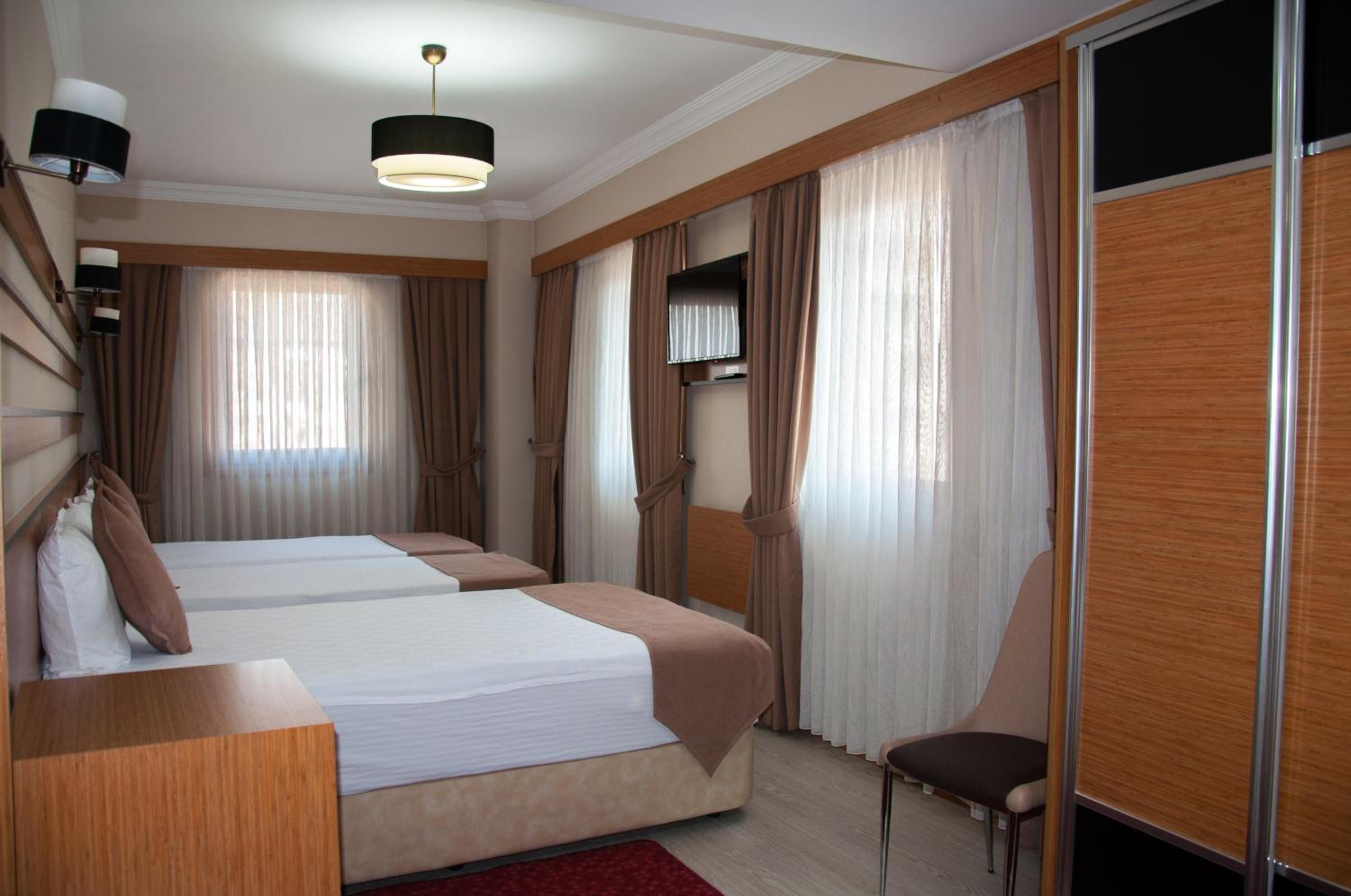 Standard Triple Room - Photo 4