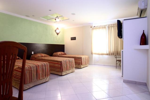 Superior Triple Room with Bath photo 2