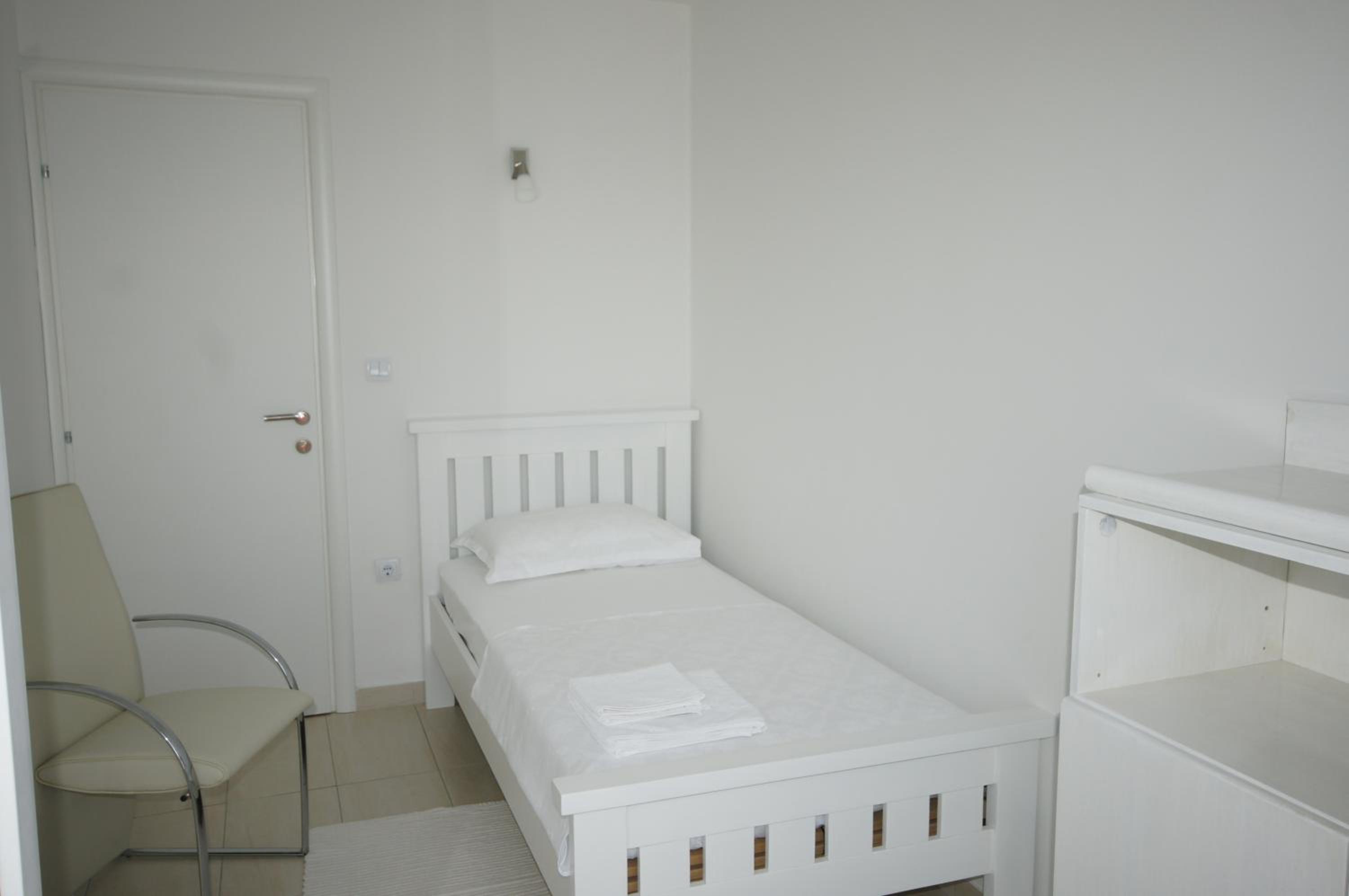 Three-Bedroom Apartment photo 2