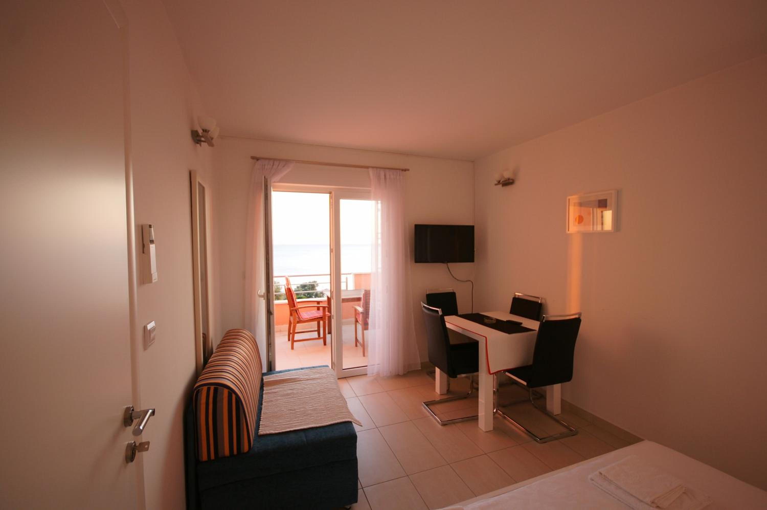 Three-Bedroom Apartment photo 1