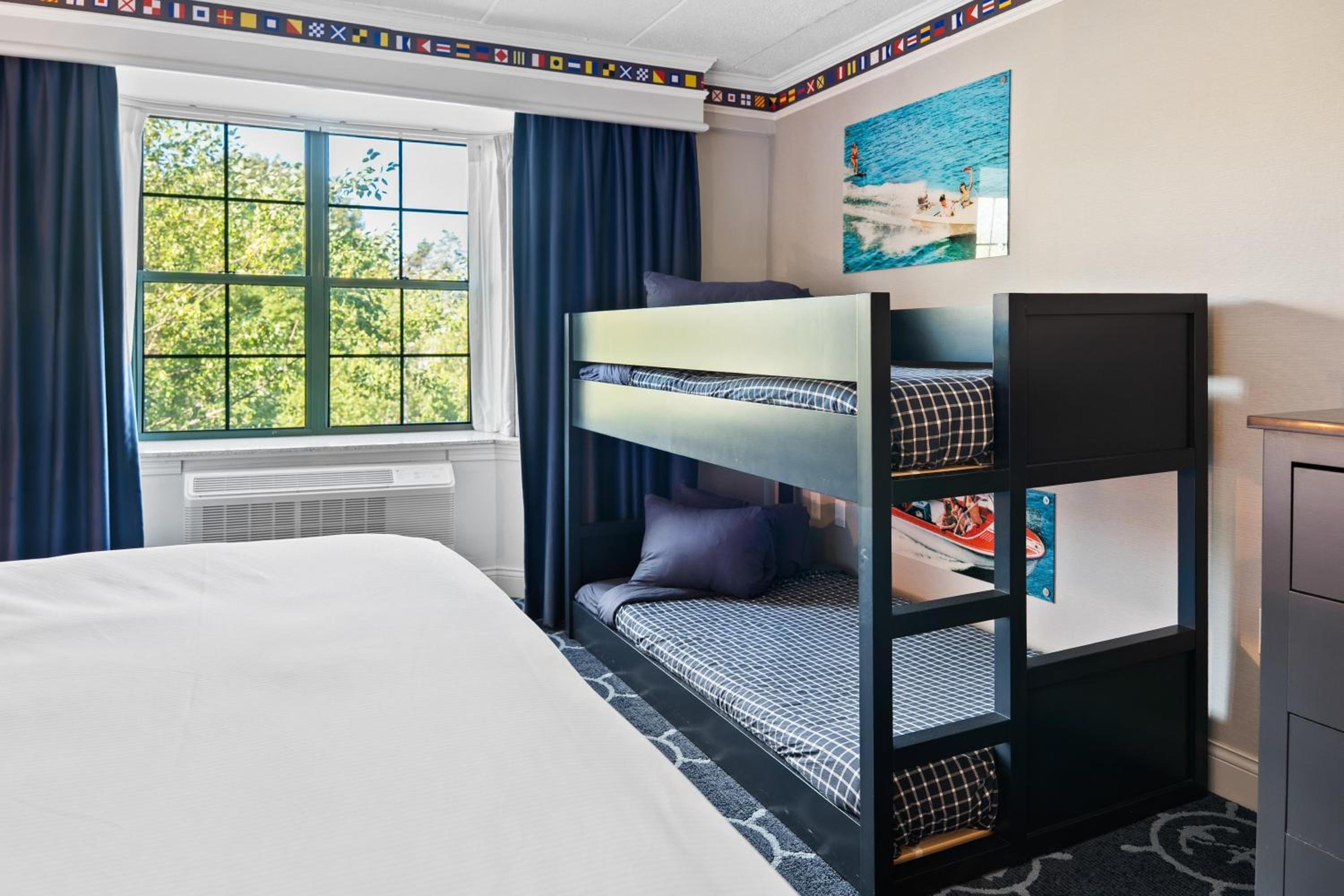 Family Room with One King Bed and One Set of Bunk Beds photo 1