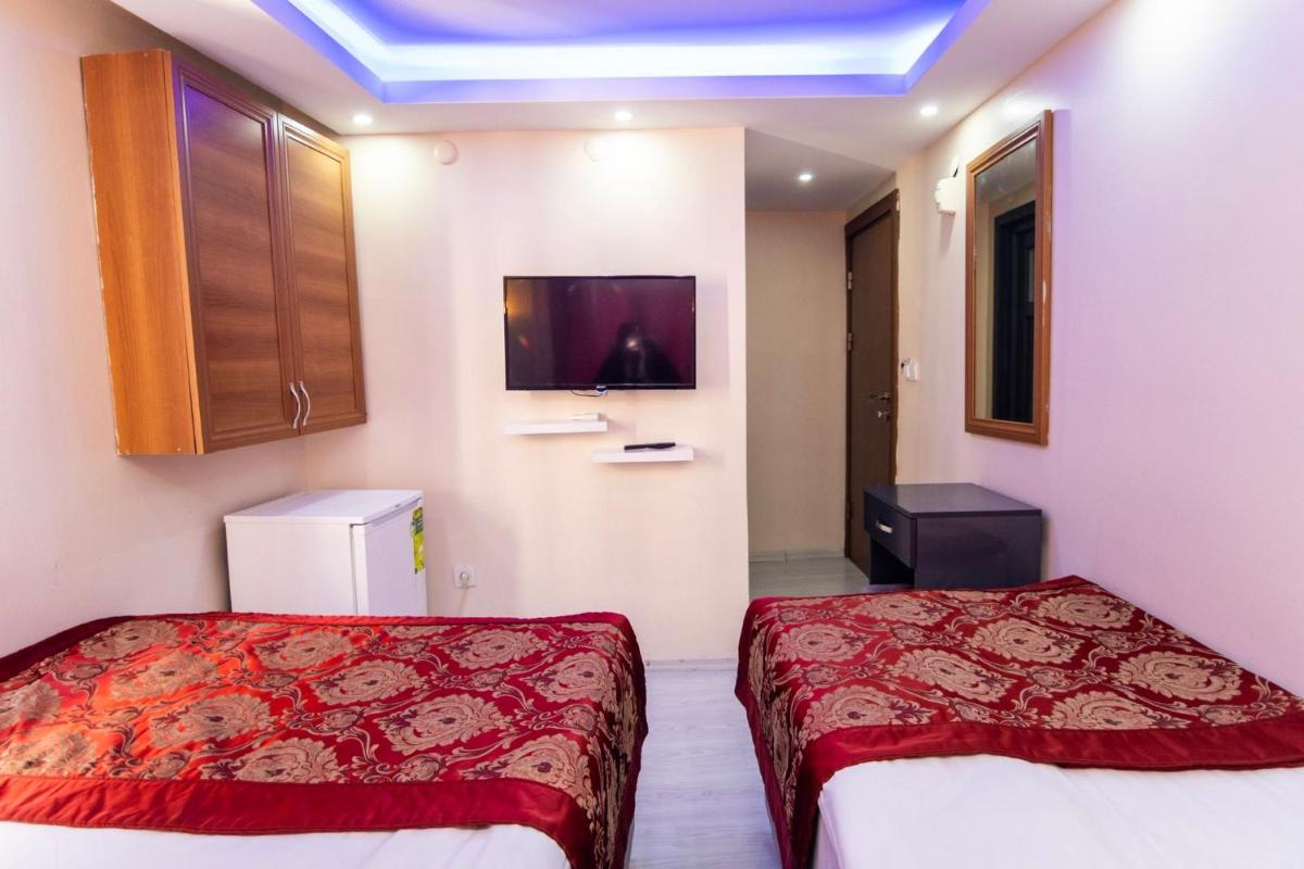 Economy Triple Room photo 1