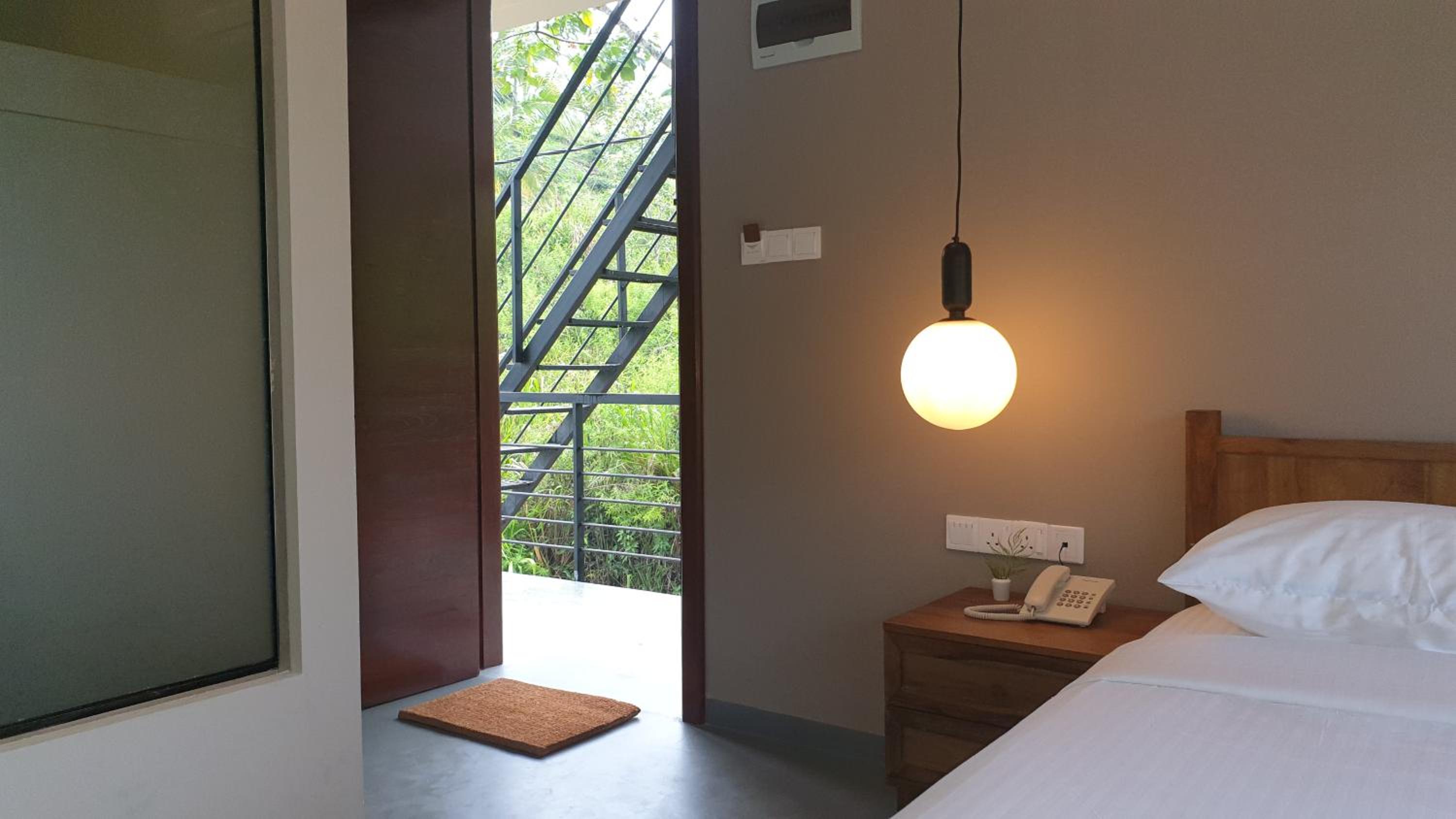 Deluxe Queen Room - Photo 14