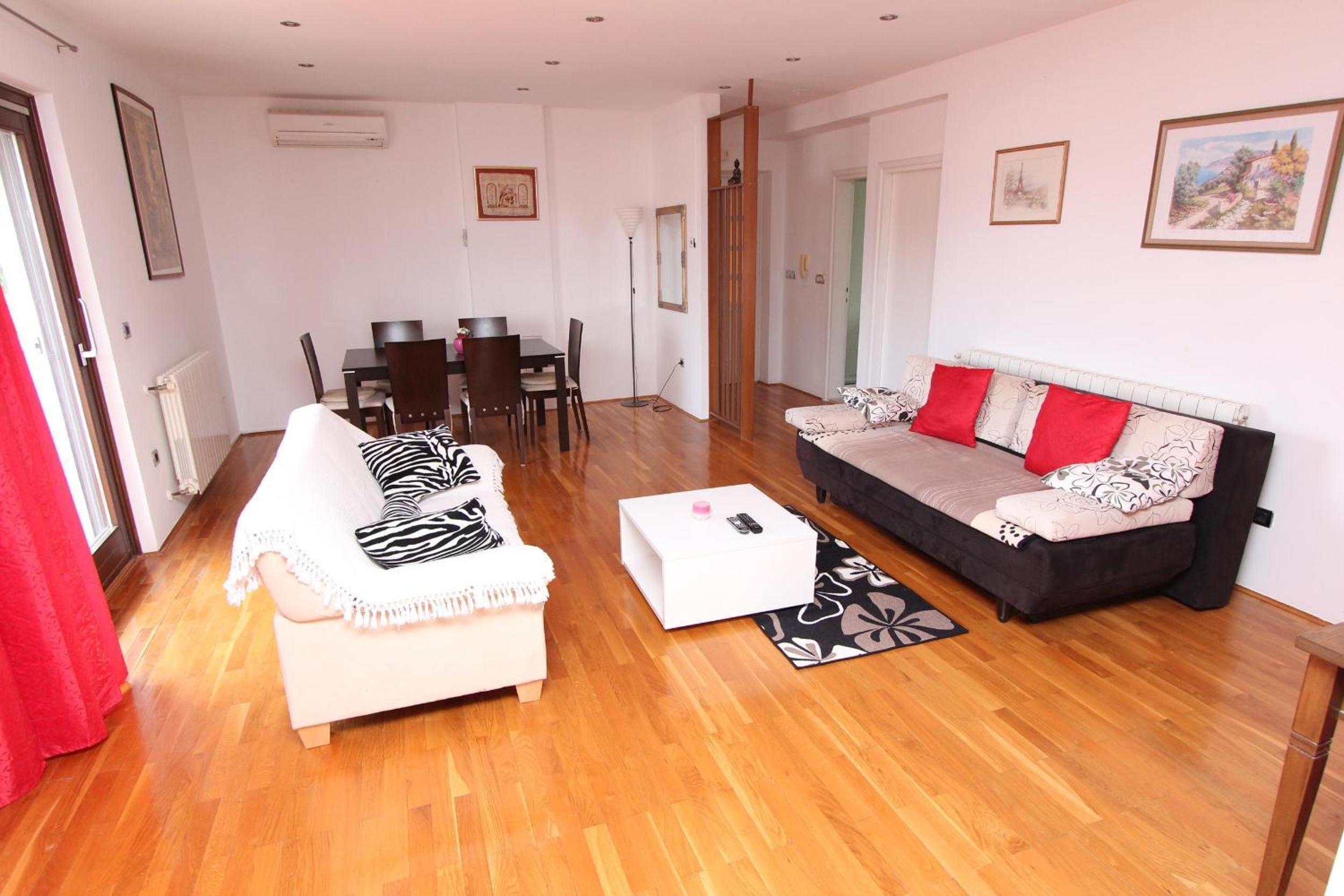 Two-Bedroom Apartment with Balcony and Sea View