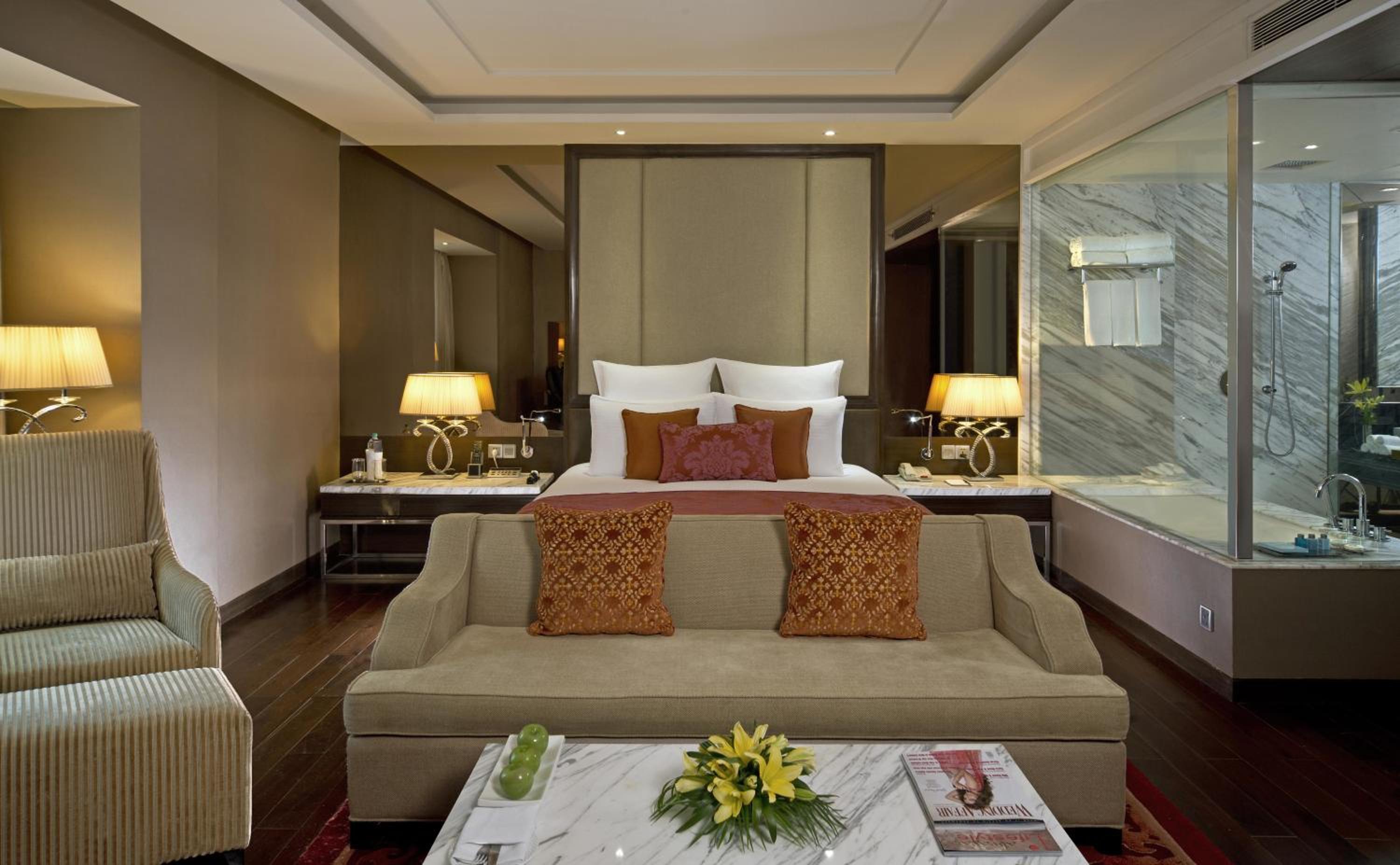 Junior Suite with Bathtub Non Smoking Room with 02 beer or 02 Pegs(IMFL) or 02 Mocktails and 02 pcs laundry, Complimentary INR 500 Hotel Credit on min usage of INR 2000 at market place restaurant on Food & Soft Beverages, 50% off on Mini Bar