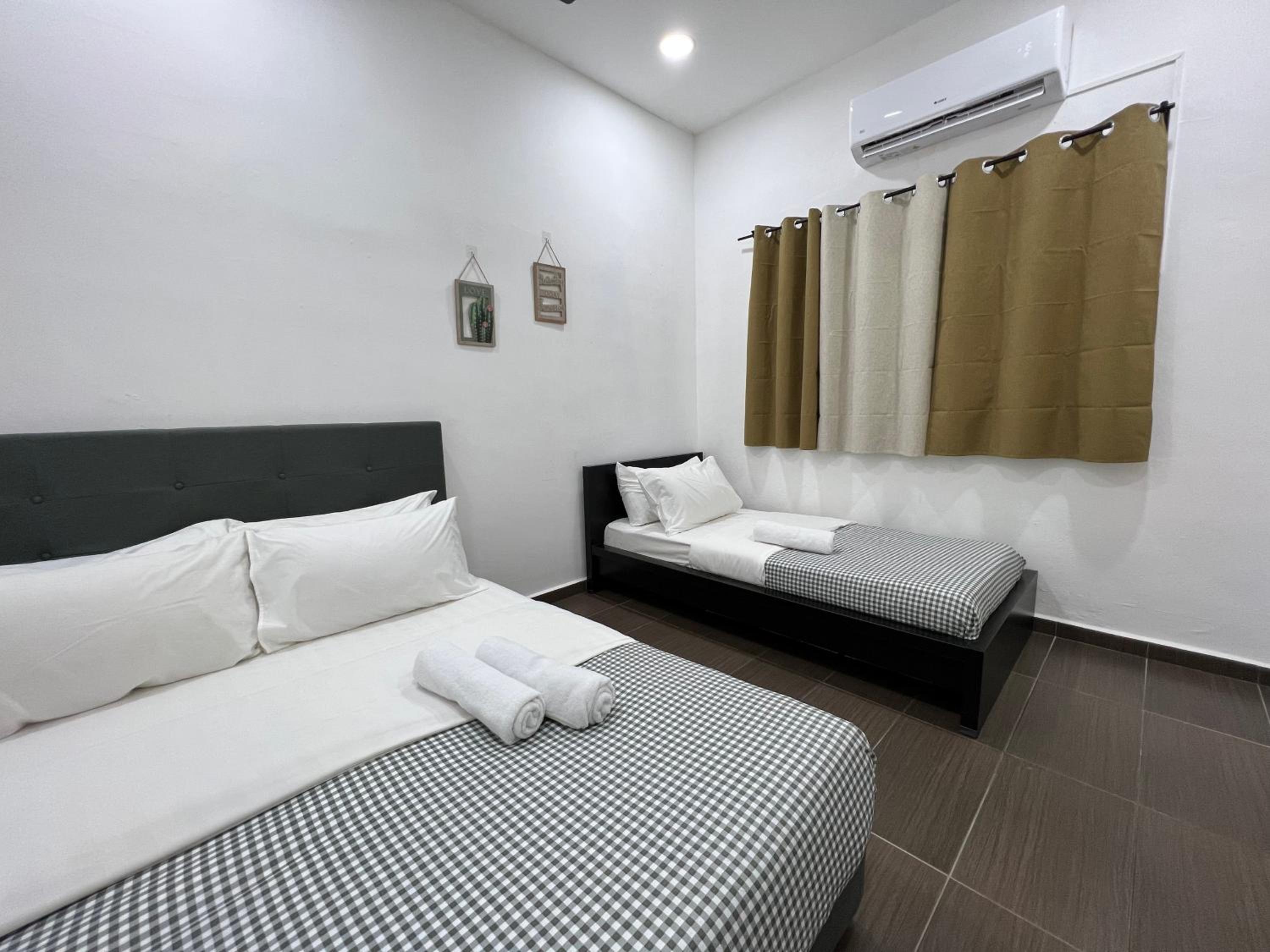 Three-Bedroom House - Photo 15