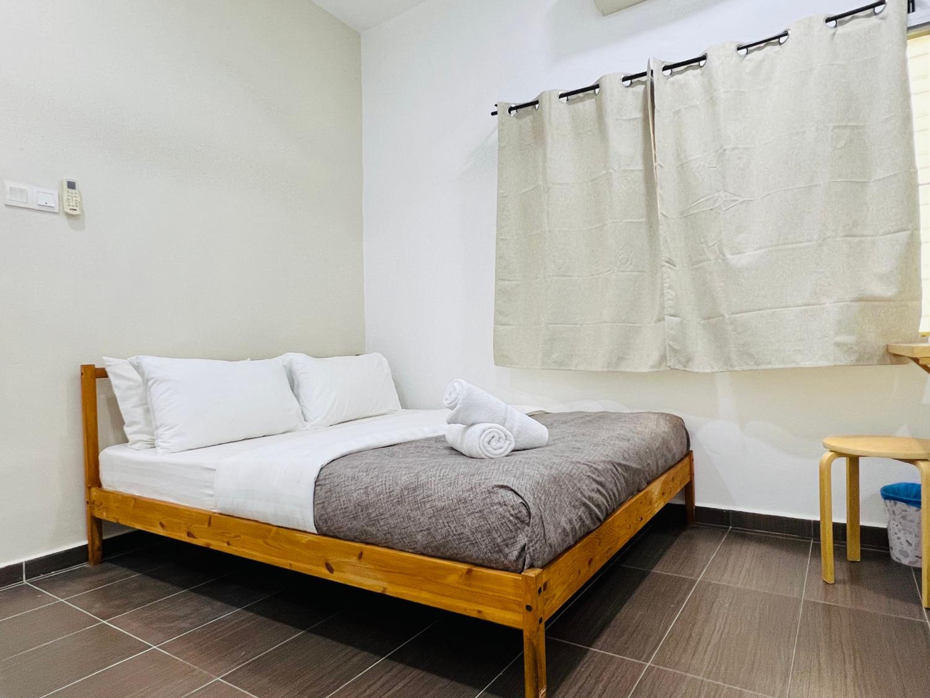 Three-Bedroom House - Photo 26