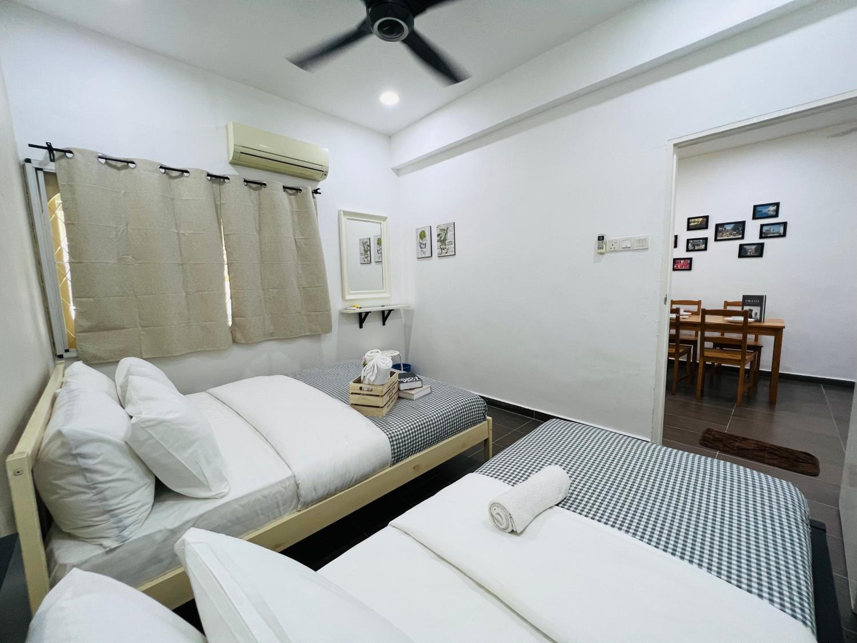 Three-Bedroom House - Photo 29