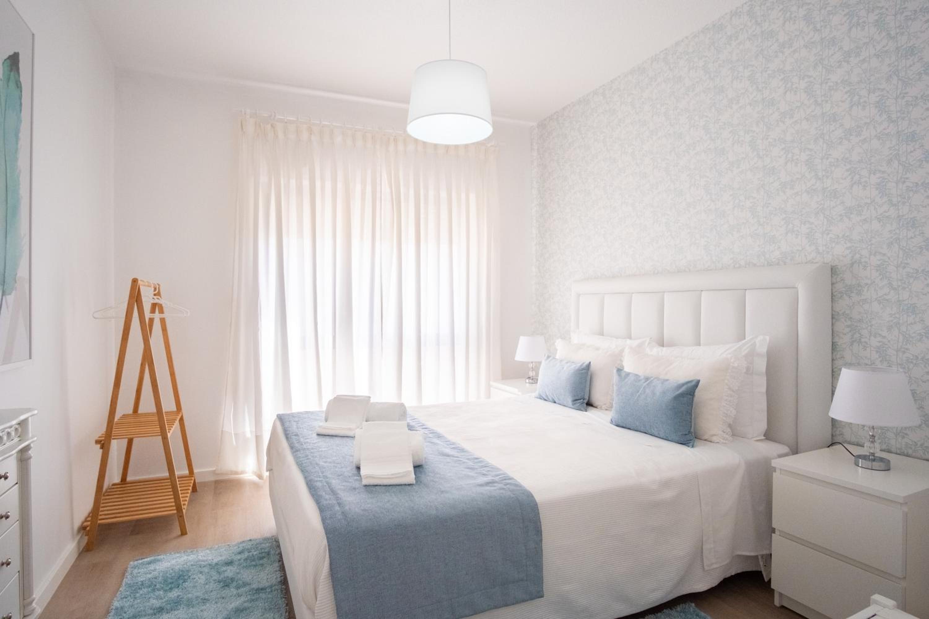 Three-Bedroom Apartment - Photo 32