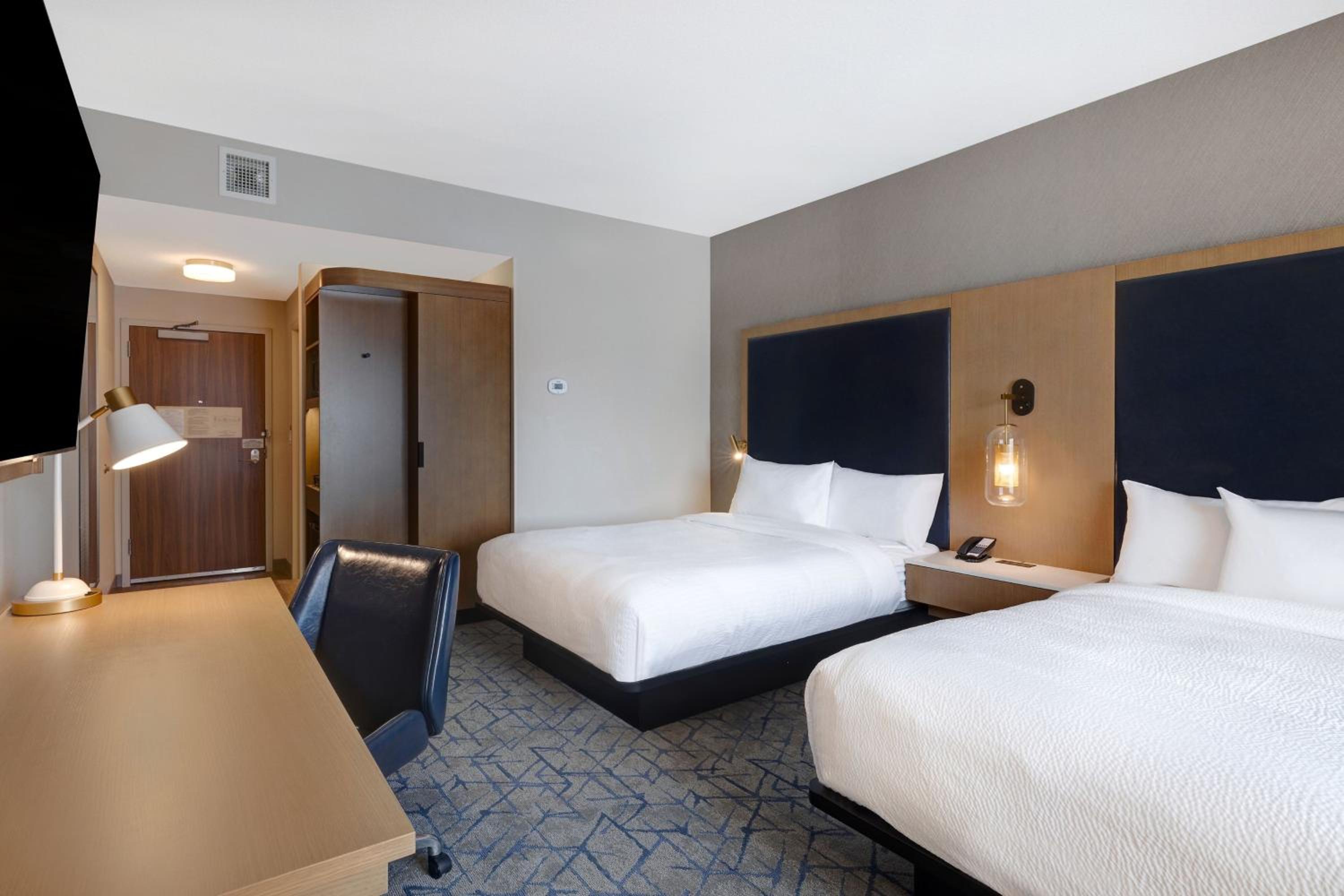 Queen Room with Two Queen Beds - Hearing Accessible - Photo 1