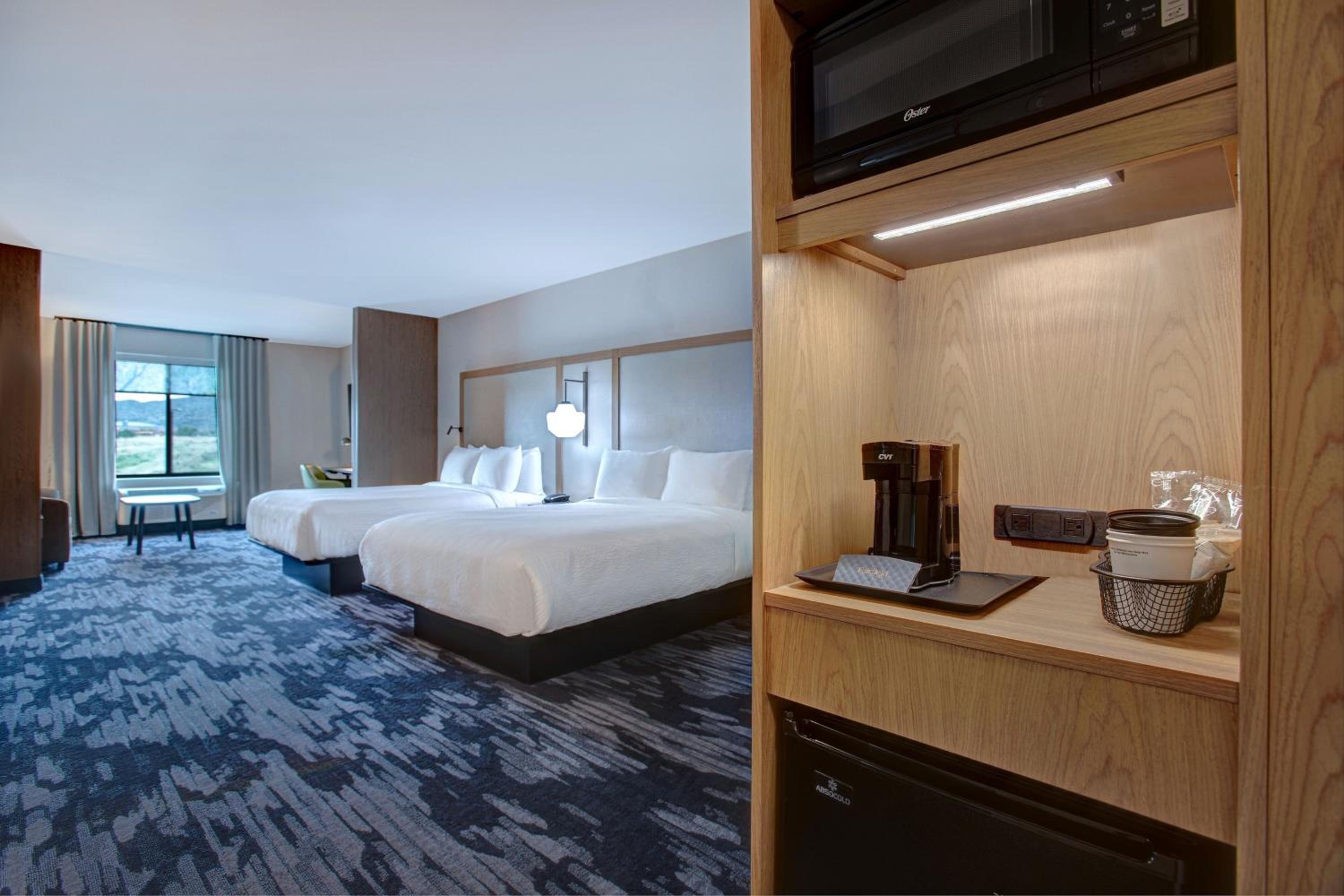 Queen Suite with Two Queen Beds and Sofa Bed - Photo 1