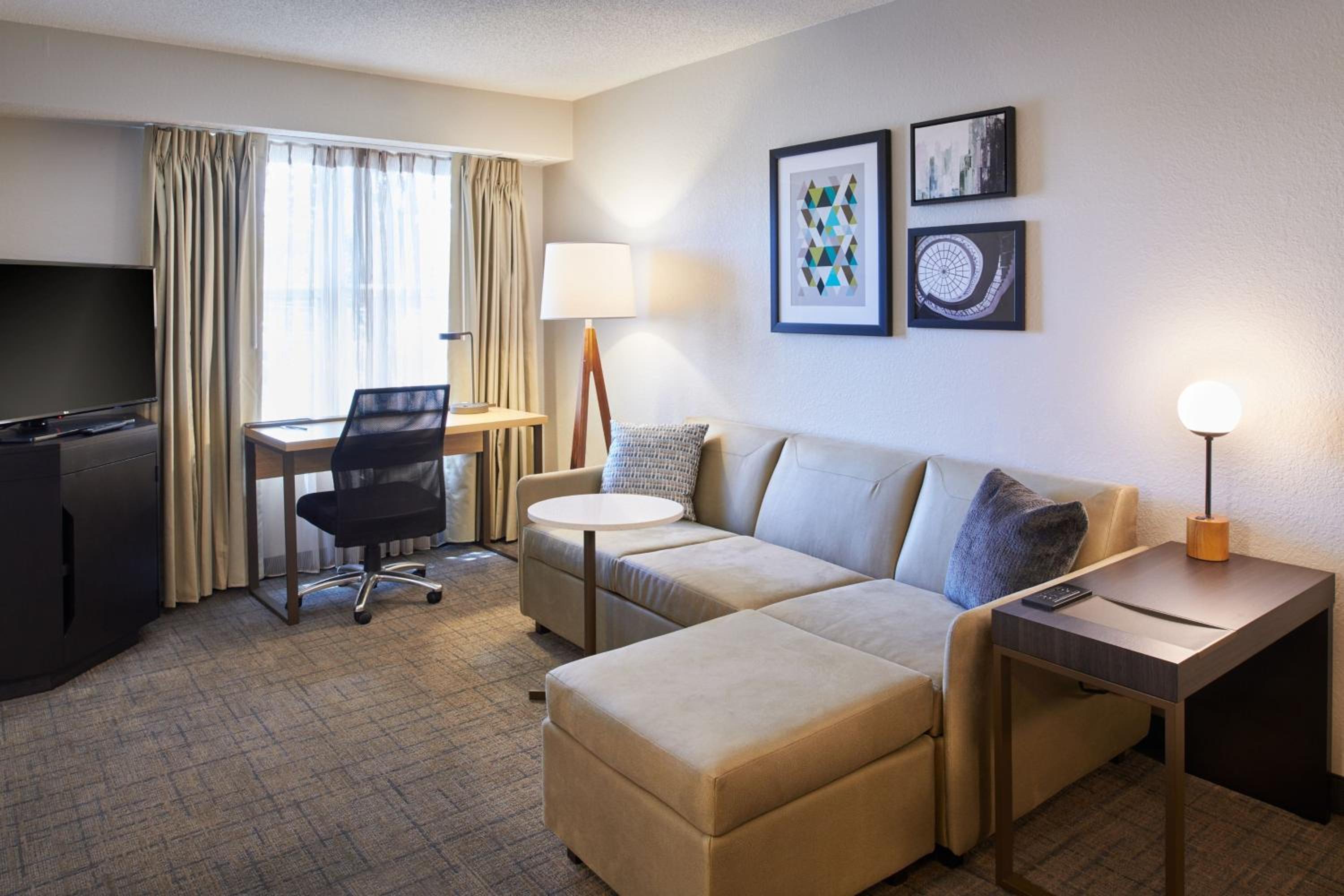One-Bedroom Queen Suite with Sofa Bed - Photo 1