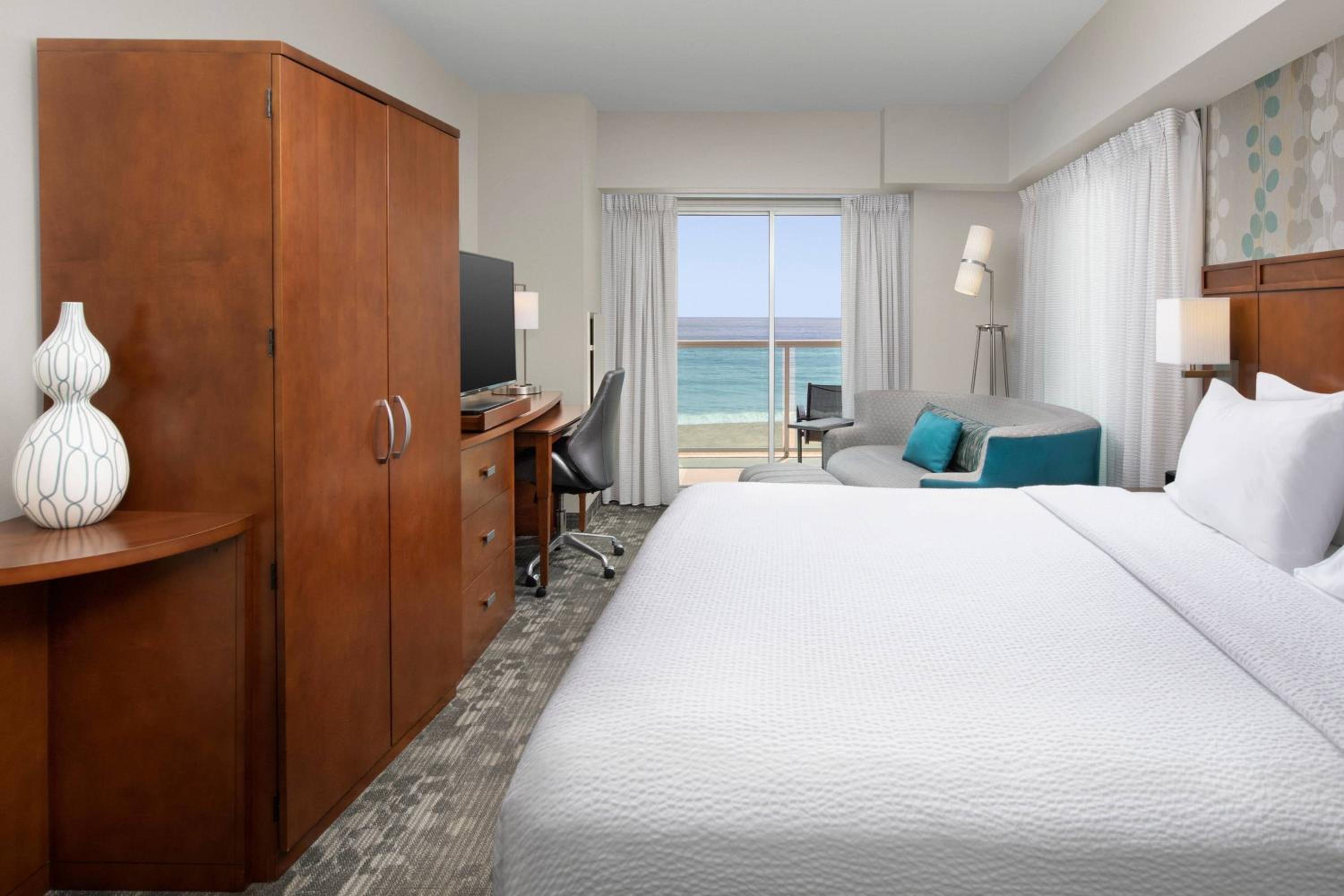 One King Bed Oceanfront with a Balcony - Photo 1
