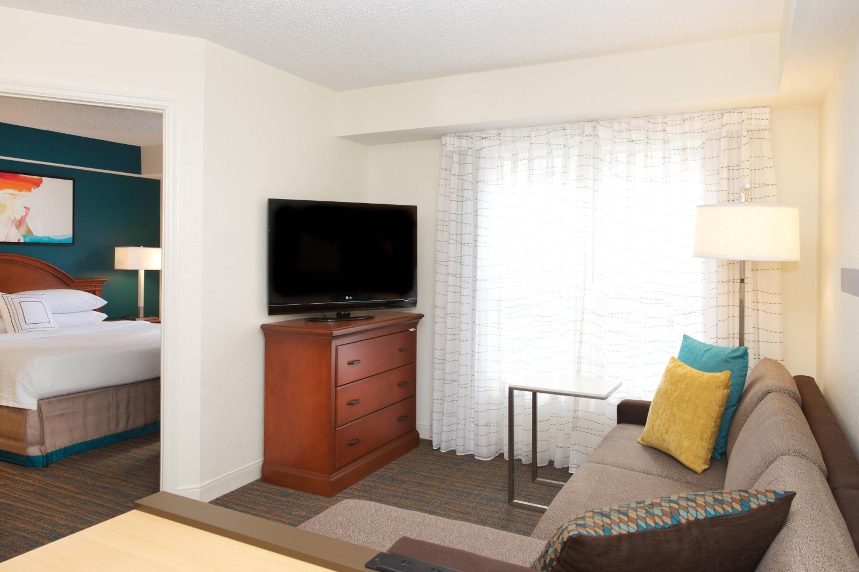 One-Bedroom King Suite with Sofa Bed and Roll-in Shower - Mobility and Hearing Accessible