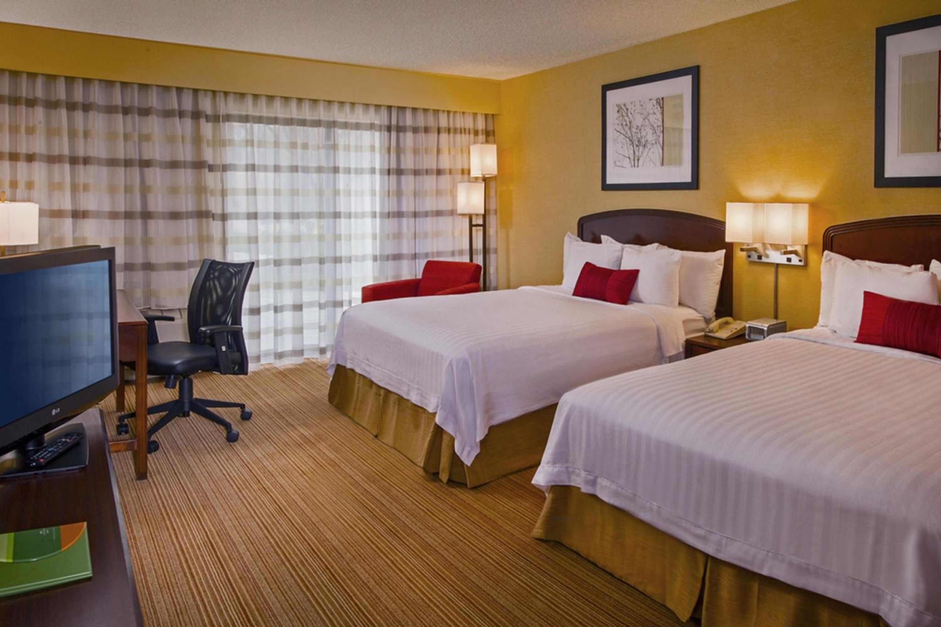 Queen Room with Two Queen Beds - Photo 1