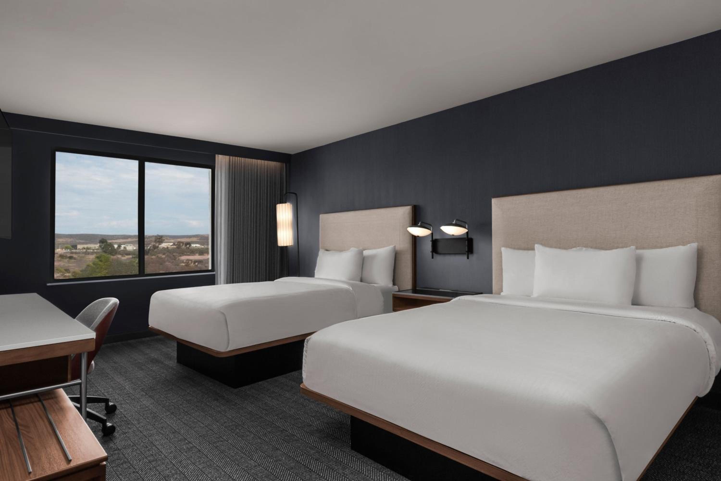 Queen Room with Two Queen Beds - Photo 2