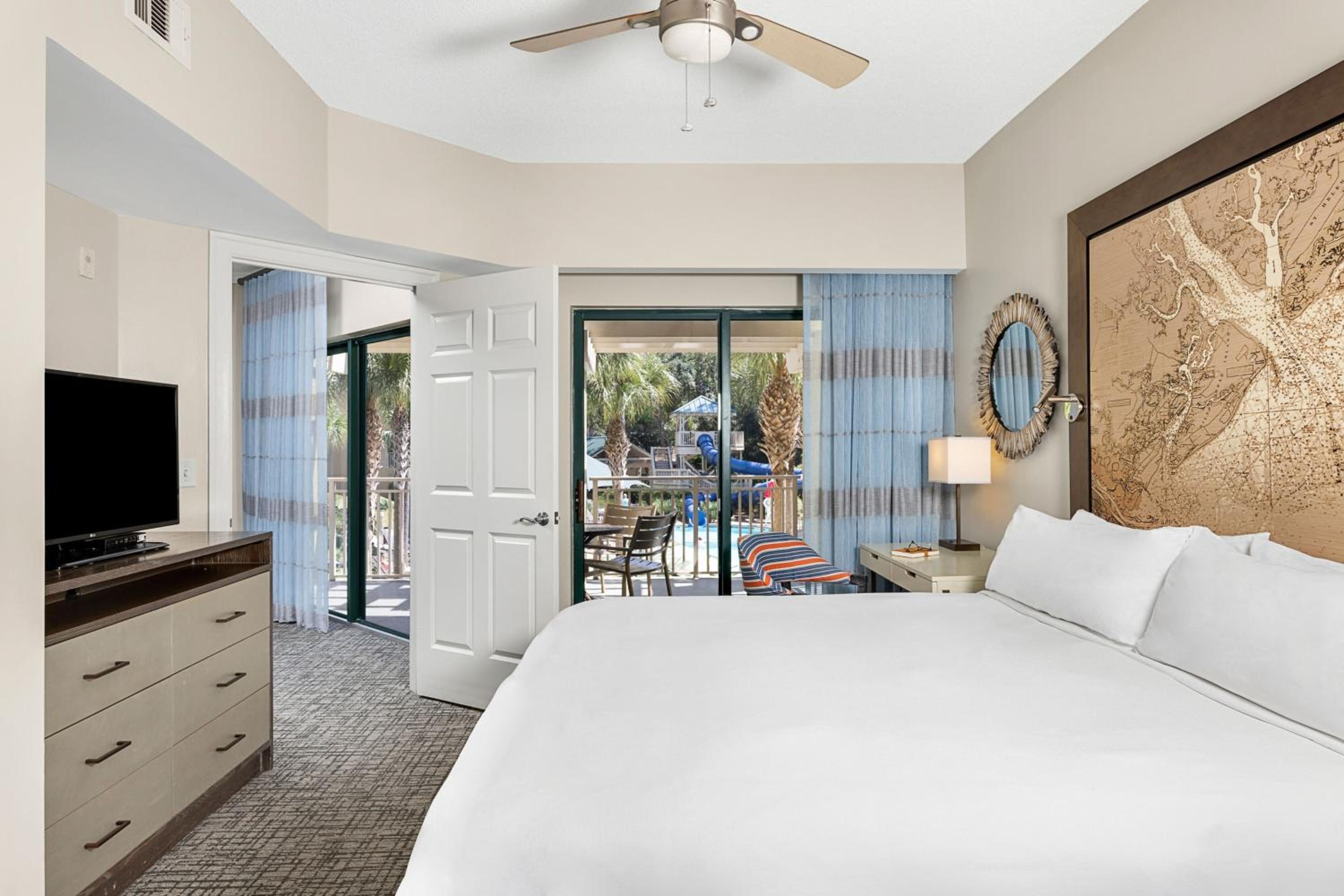 Two-Bedroom Villa with One King and Two Queen Beds with Sofa Bed and Garden View
