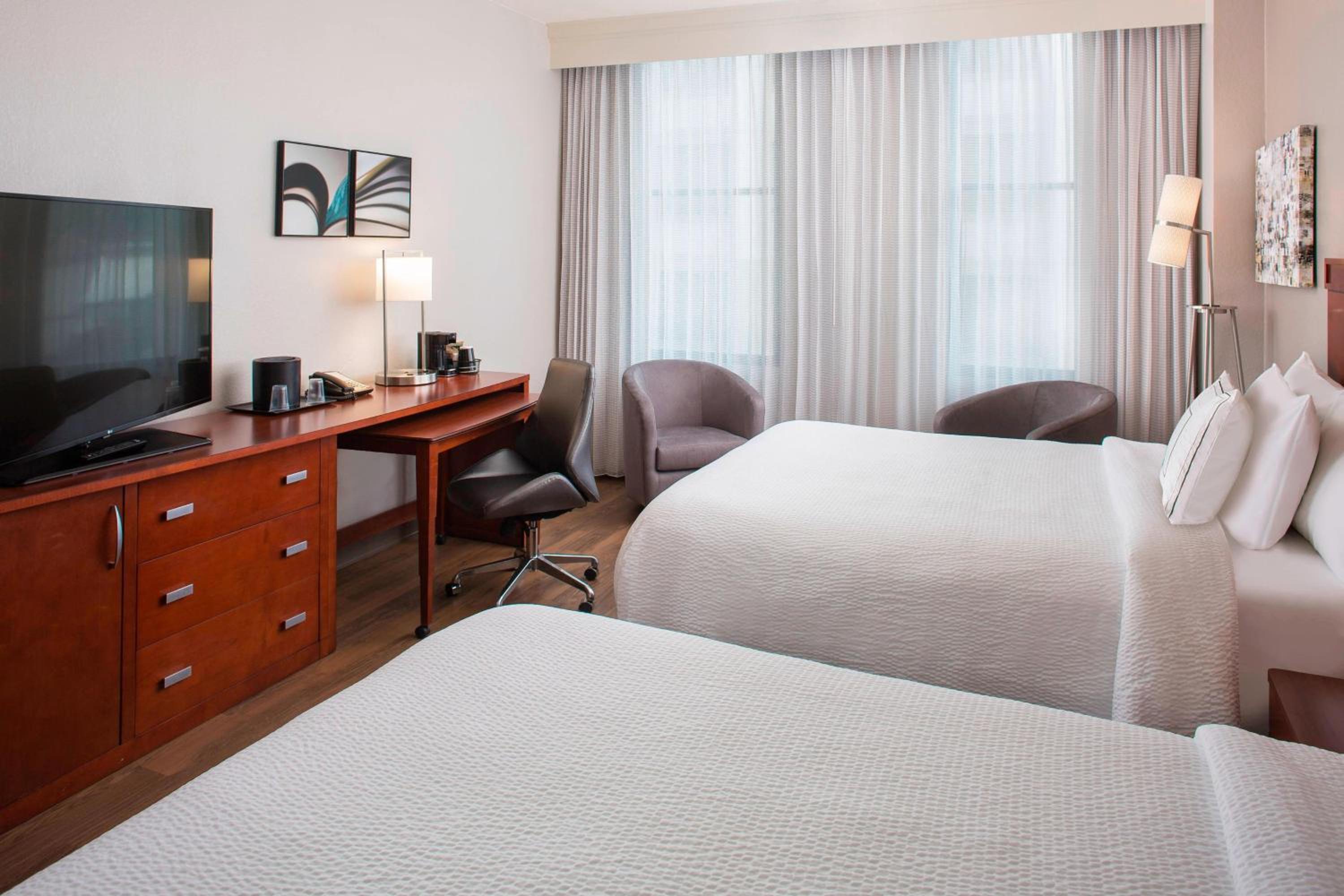 Queen Room with Two Queen Beds - Photo 1