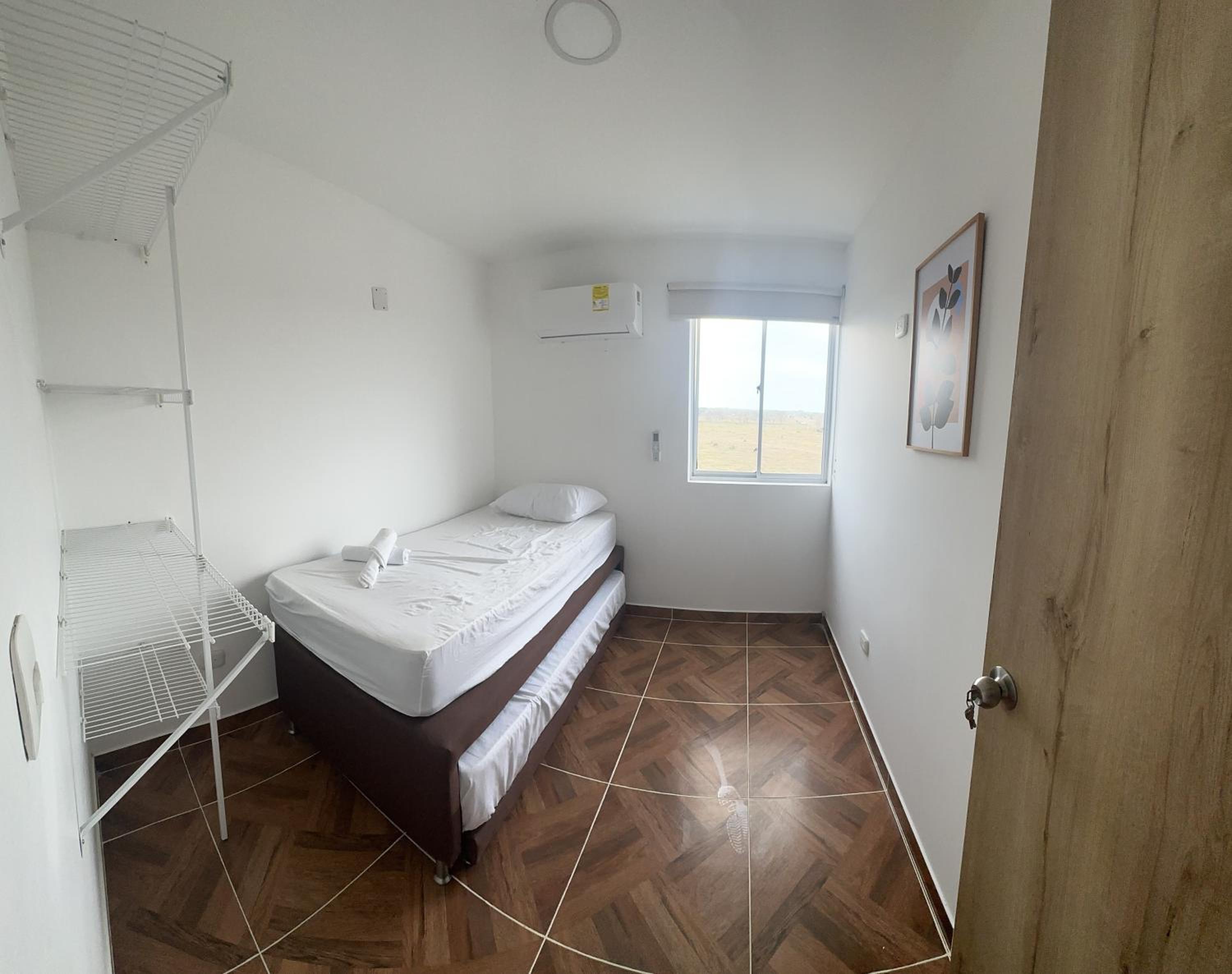 Three-Bedroom Apartment photo 1
