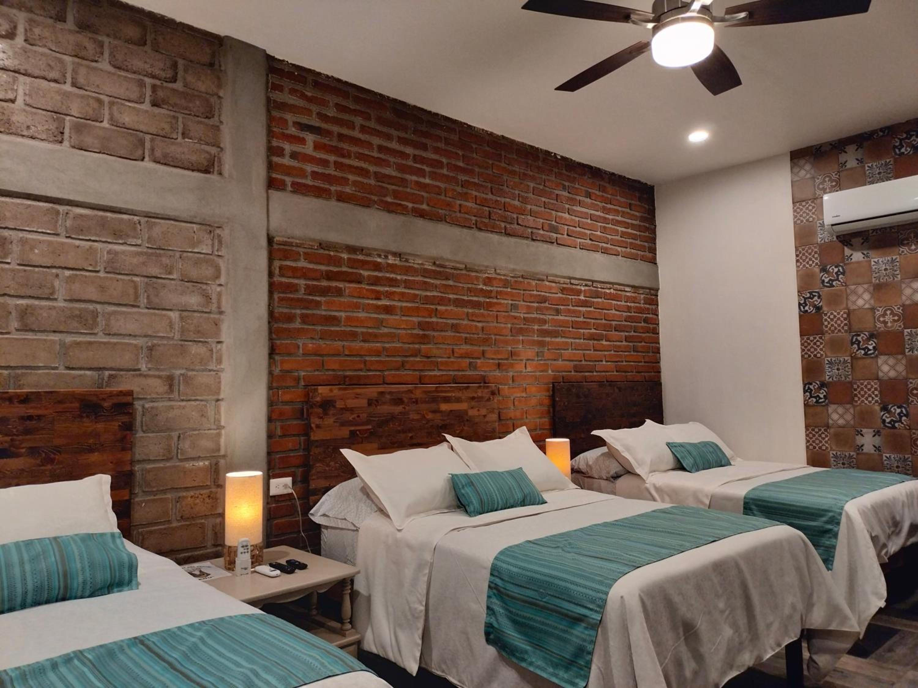 Deluxe Triple Room - Photo 1